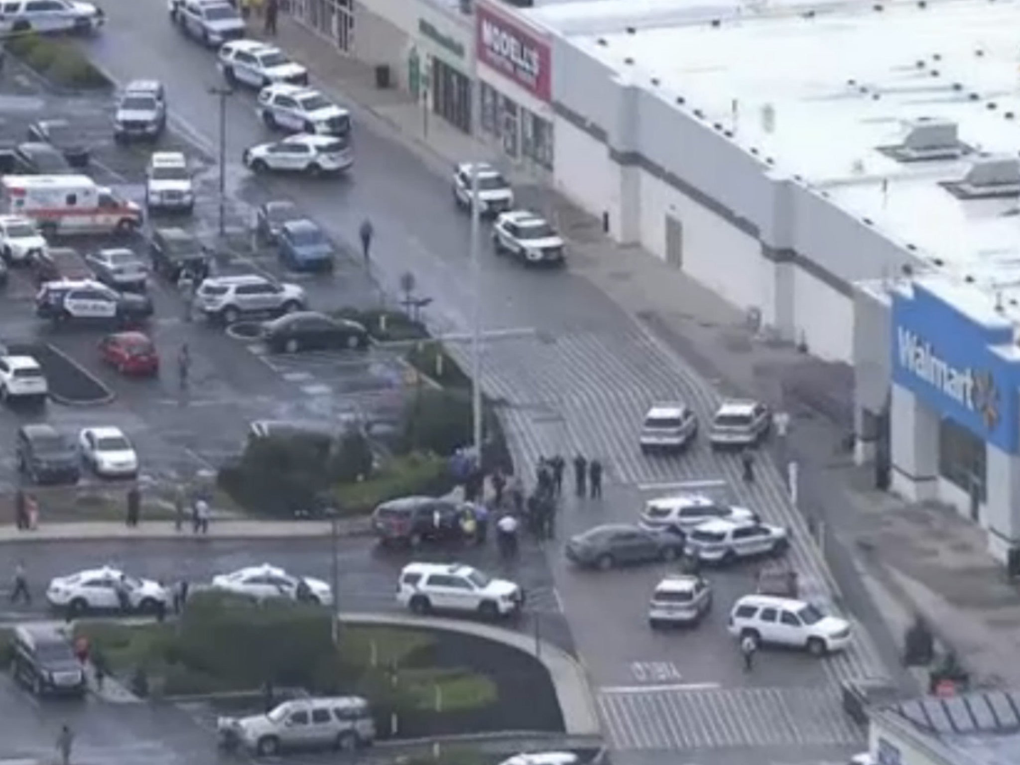 The heavy police presence outside the Walmart