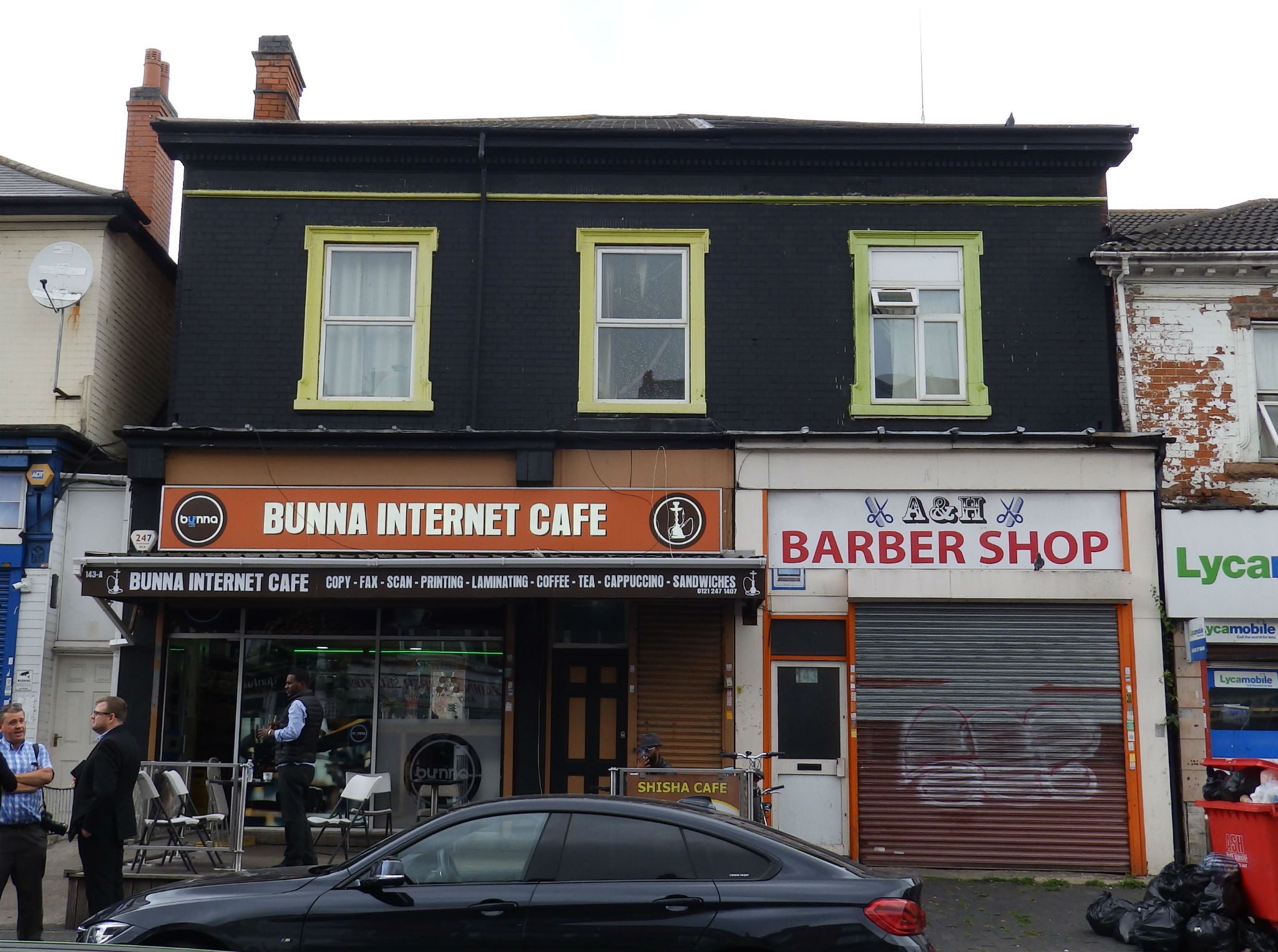 Police searched a flat above an internet cafe and barbers' shop in Sparkbrook, Birmingham