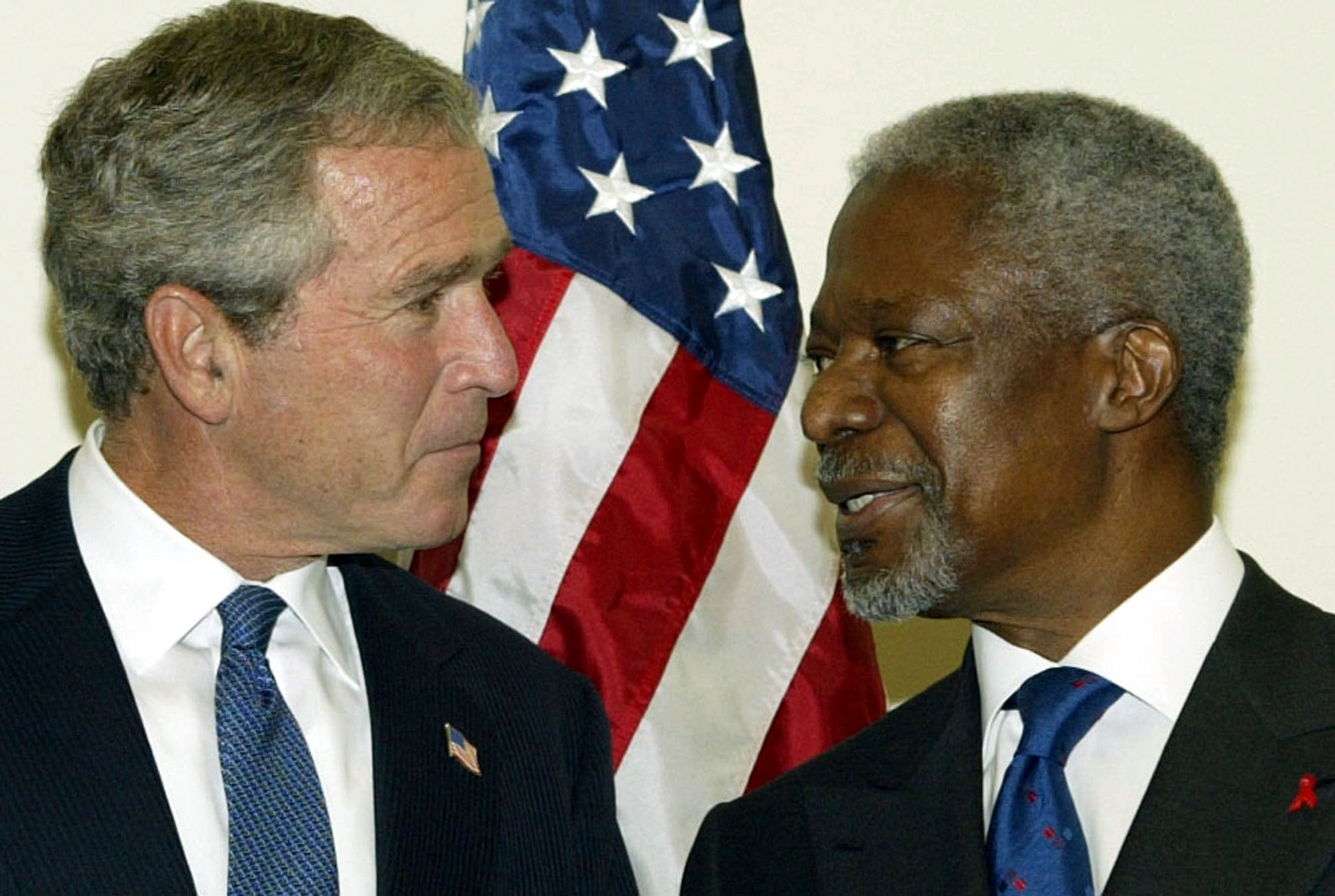 Kofi Annan, here with former American president George W Bush, was an outspoken critic of the US-led war on Iraq