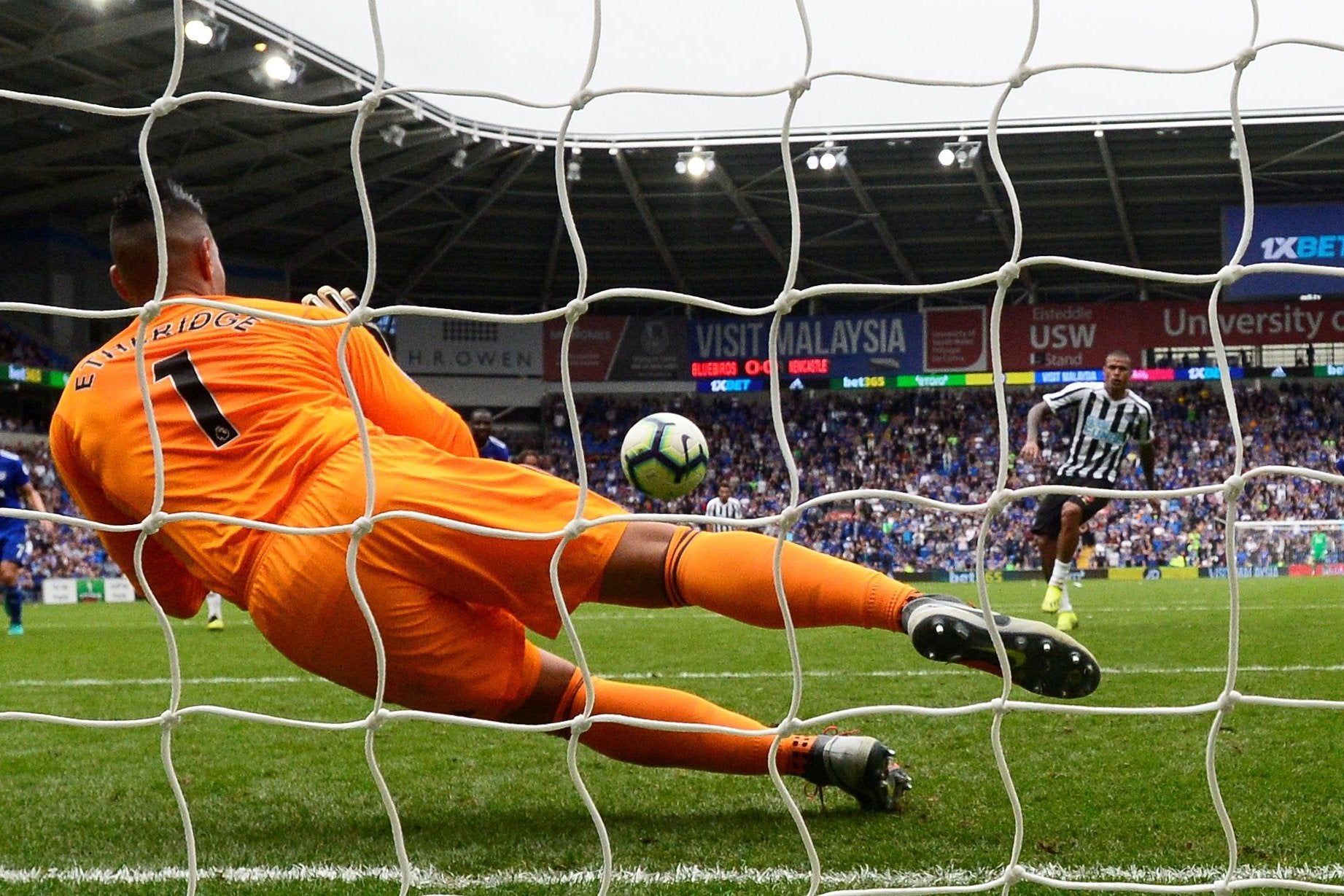 Neil Etheridge saves Kenedy's injury-time penalty