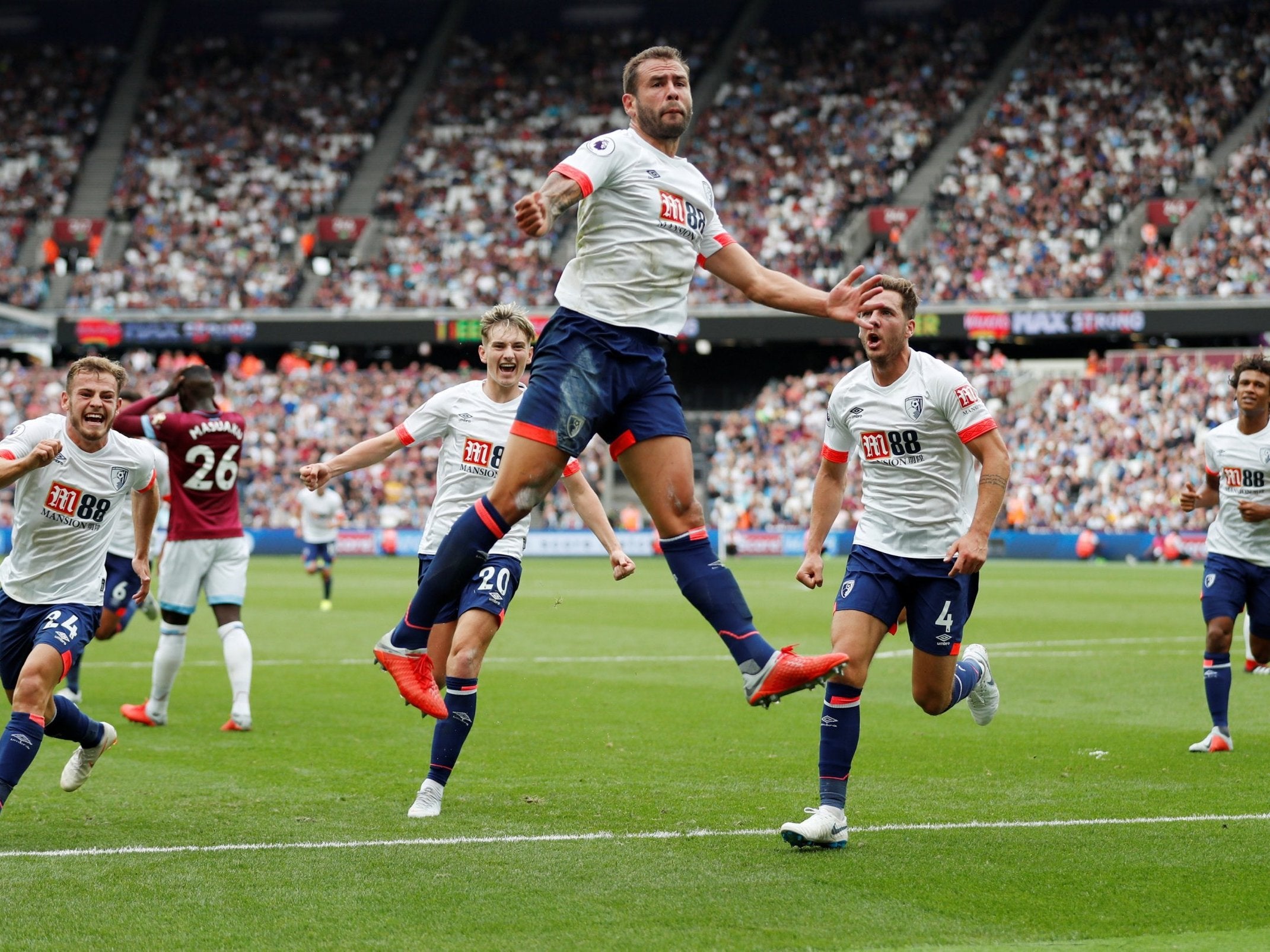 Steve Cook celebrates after outting West Ham in front