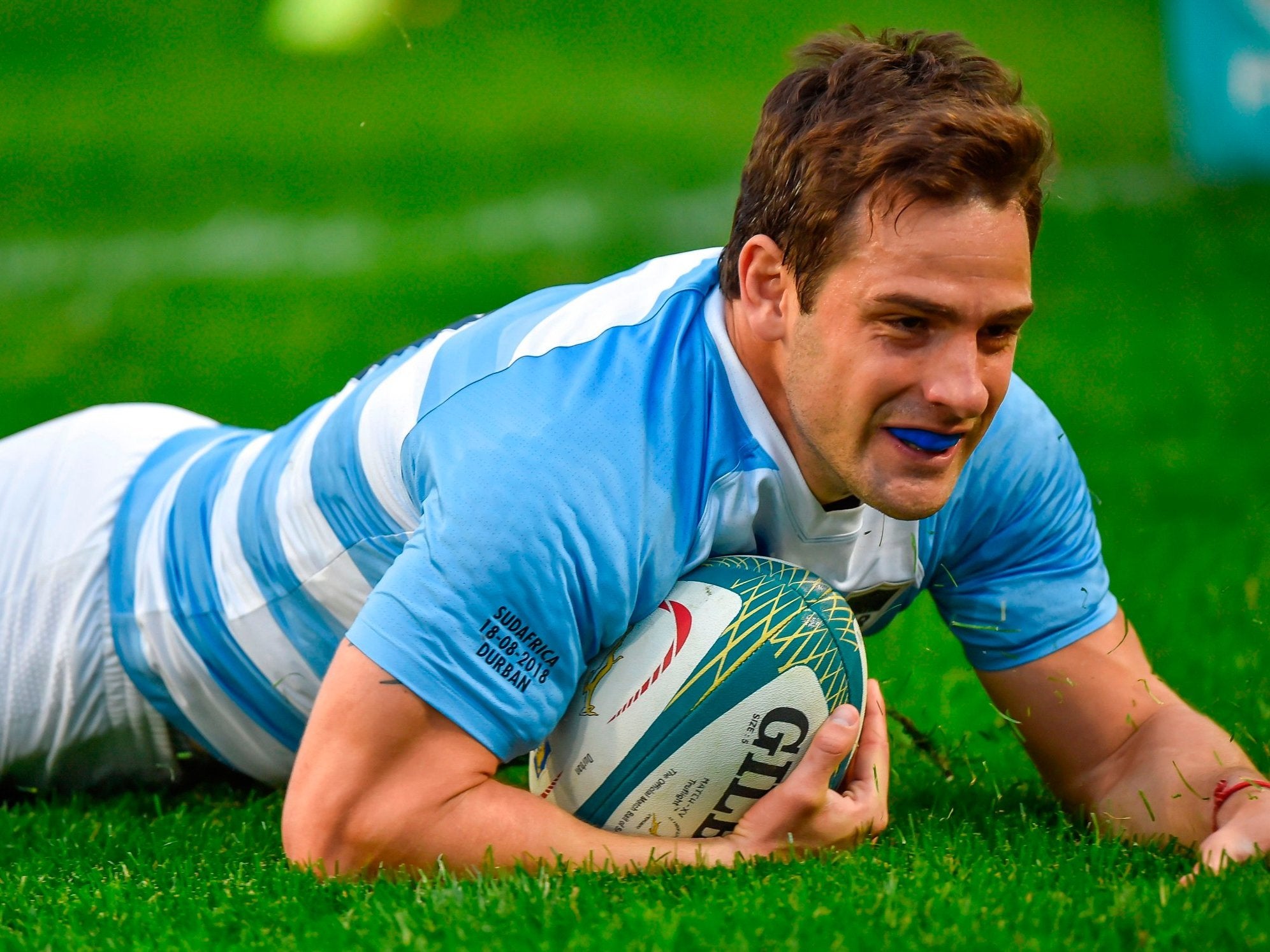 Argentina's fly-half Nicolas Sanchez reacts after scoring a try