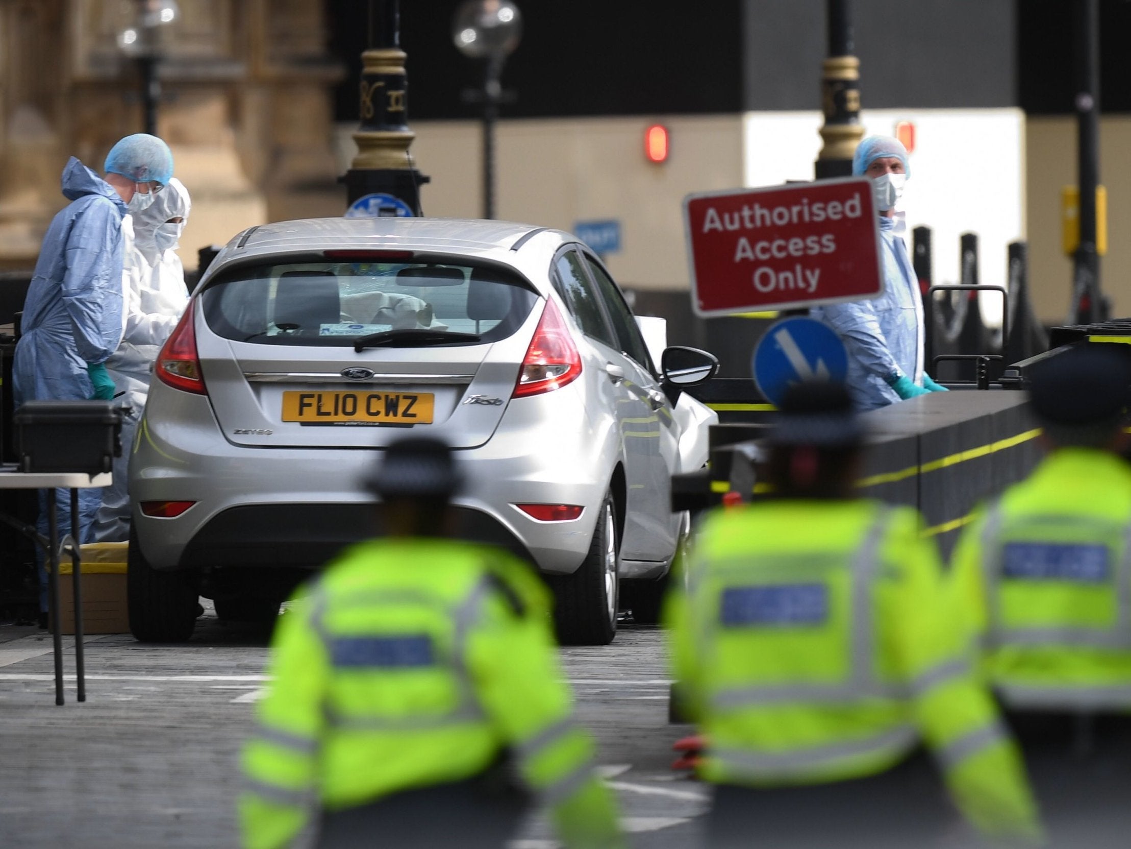 The car crashed into security barriers outside the Houses of Parliament