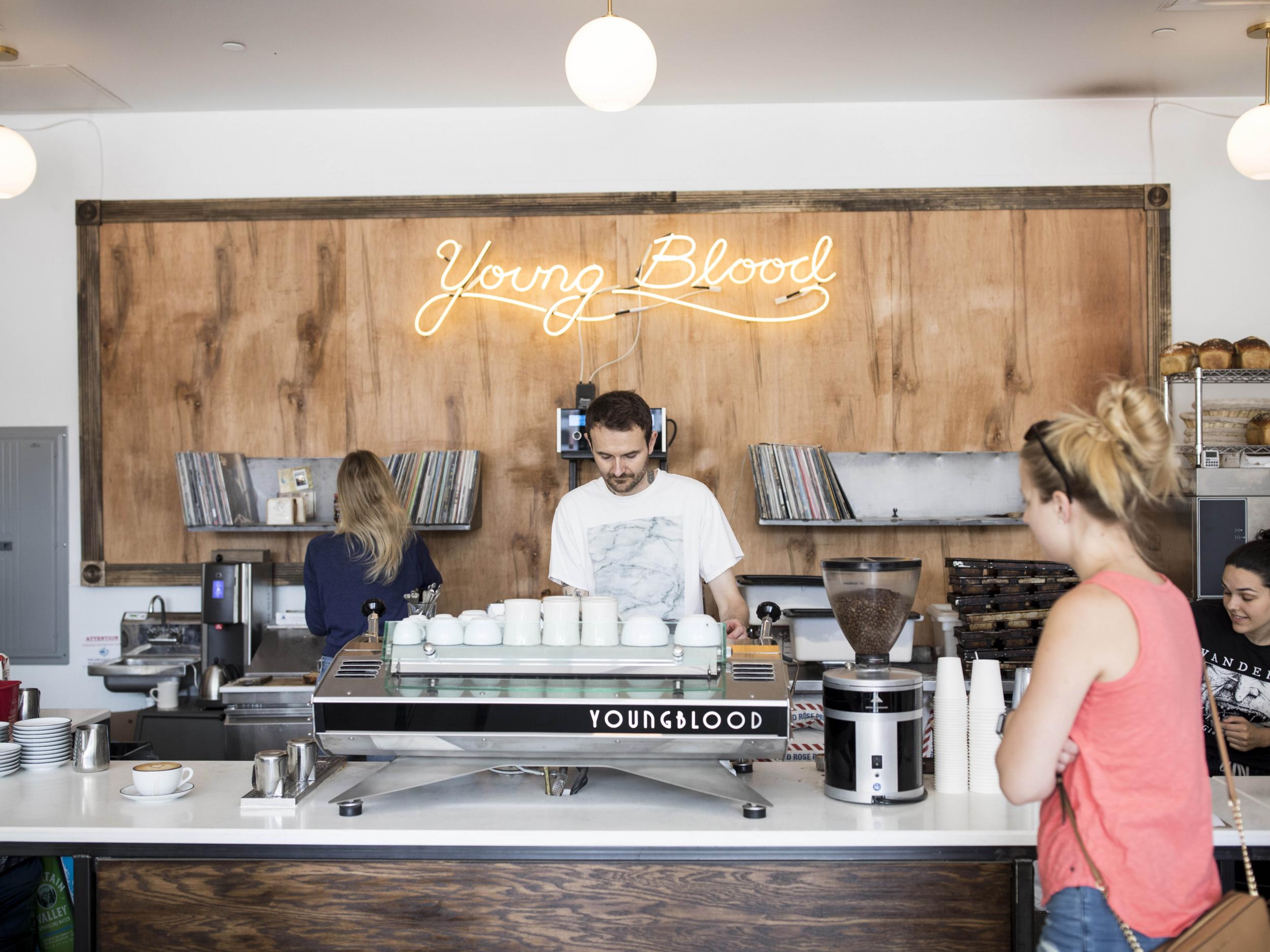 Tim Griffin pulls a cup for a customer at Young Blood Coffee, home of reportedly rapturous cinnamon toast