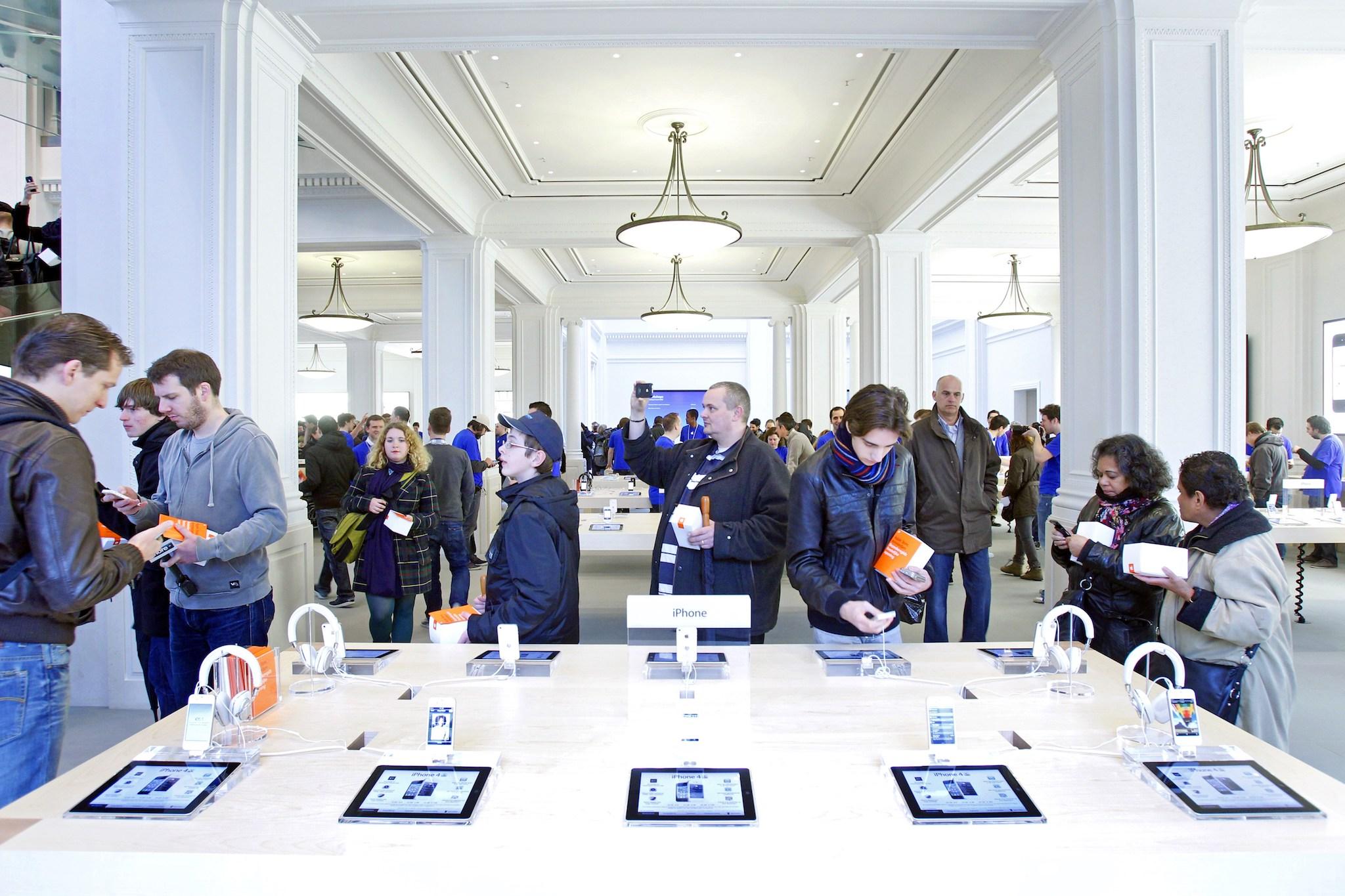 The first Apple Store in the Netherlands opens its doors in Amsterdam, on March 4, 2012. Hours before the opening there was already a long line of Apple fans waiting to shop on the Leidseplein