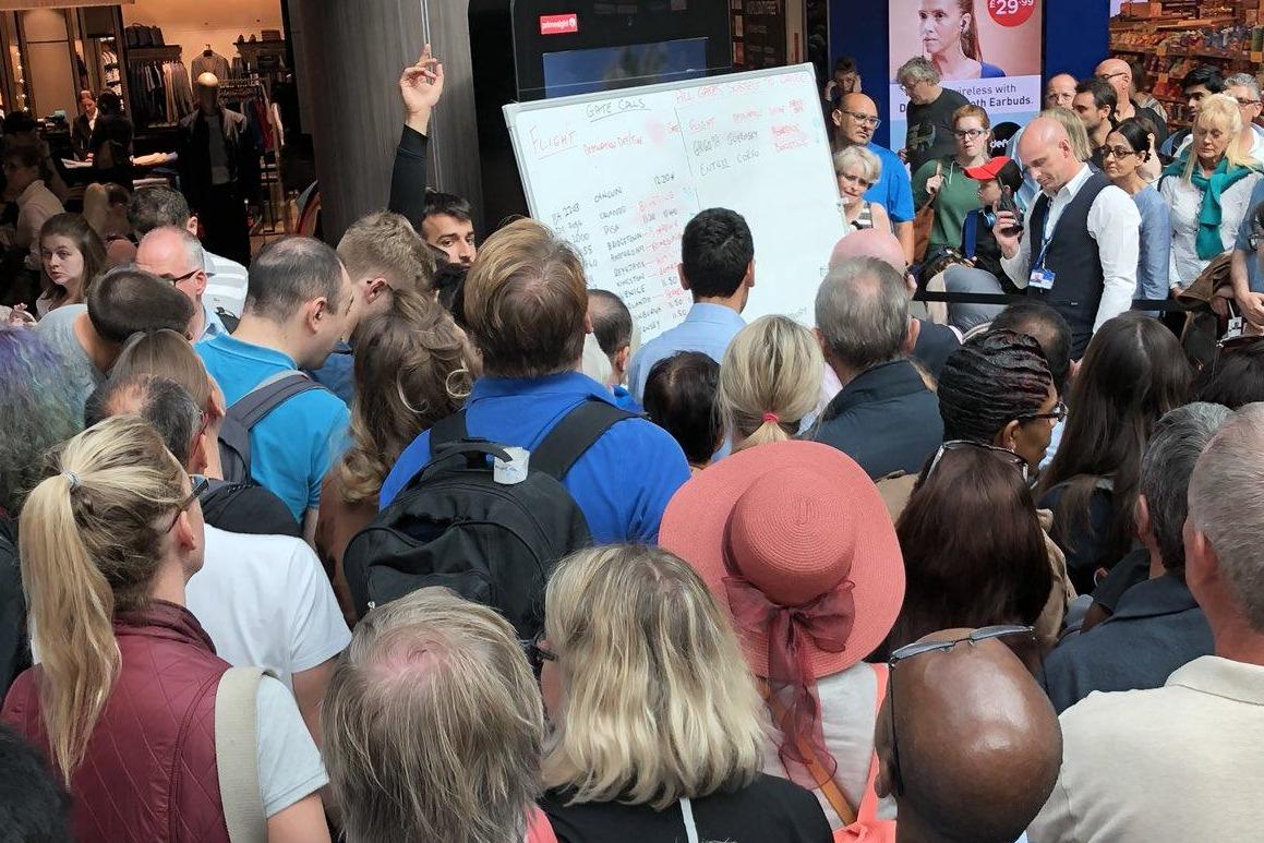 Destination row: the whiteboard at Gatwick airport’s South Terminal after the normal departure screens failed