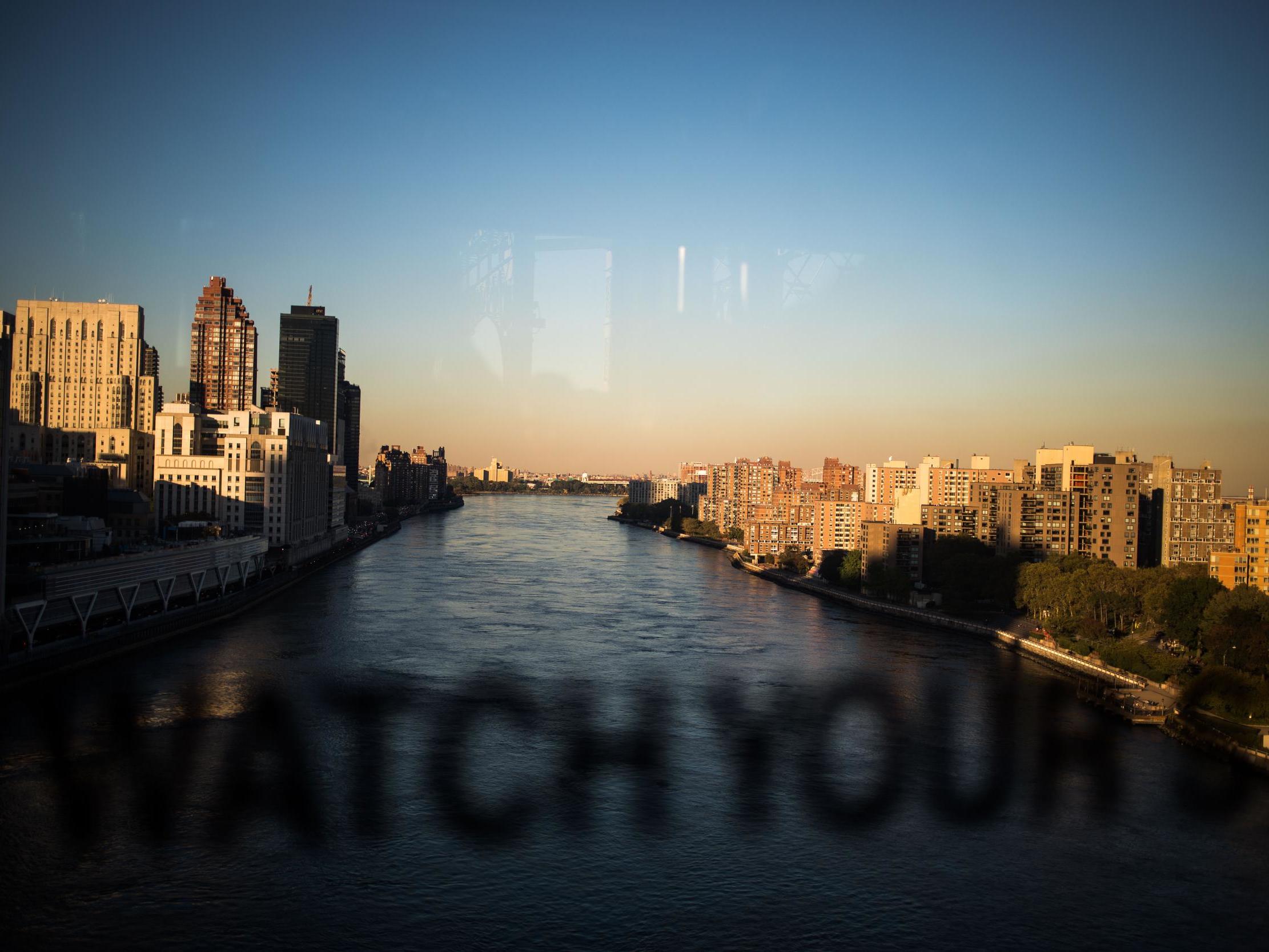 Roosevelt Island can be seen on the right of the East River