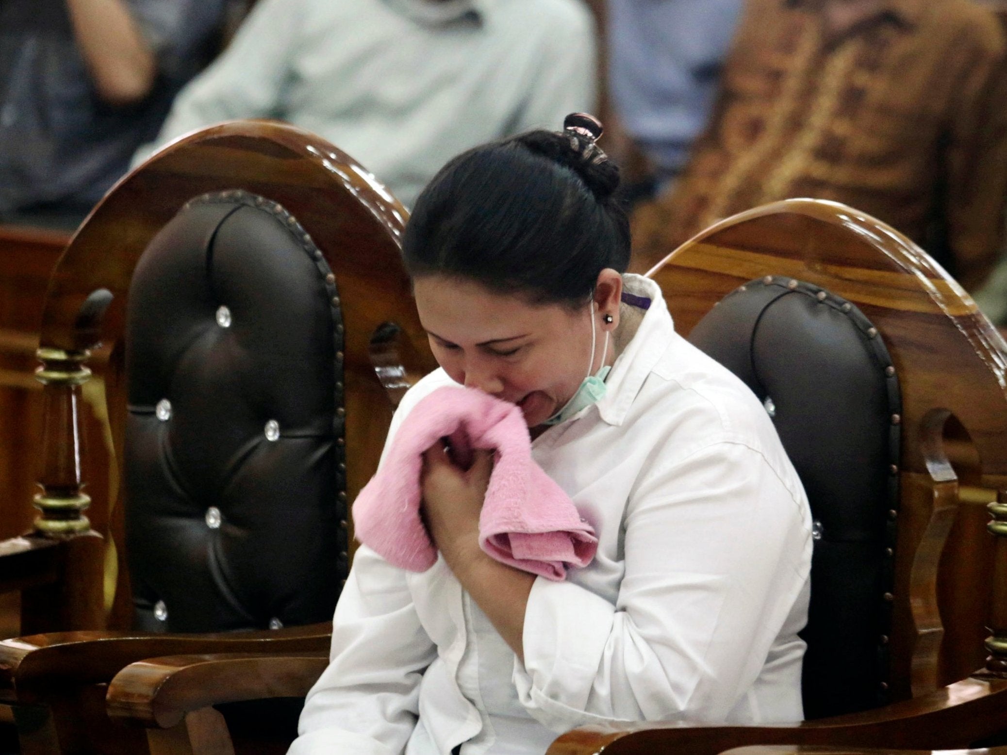 Meiliana wept as her sentence was read out at a district court in Medan, North Sumatra, Indonesia