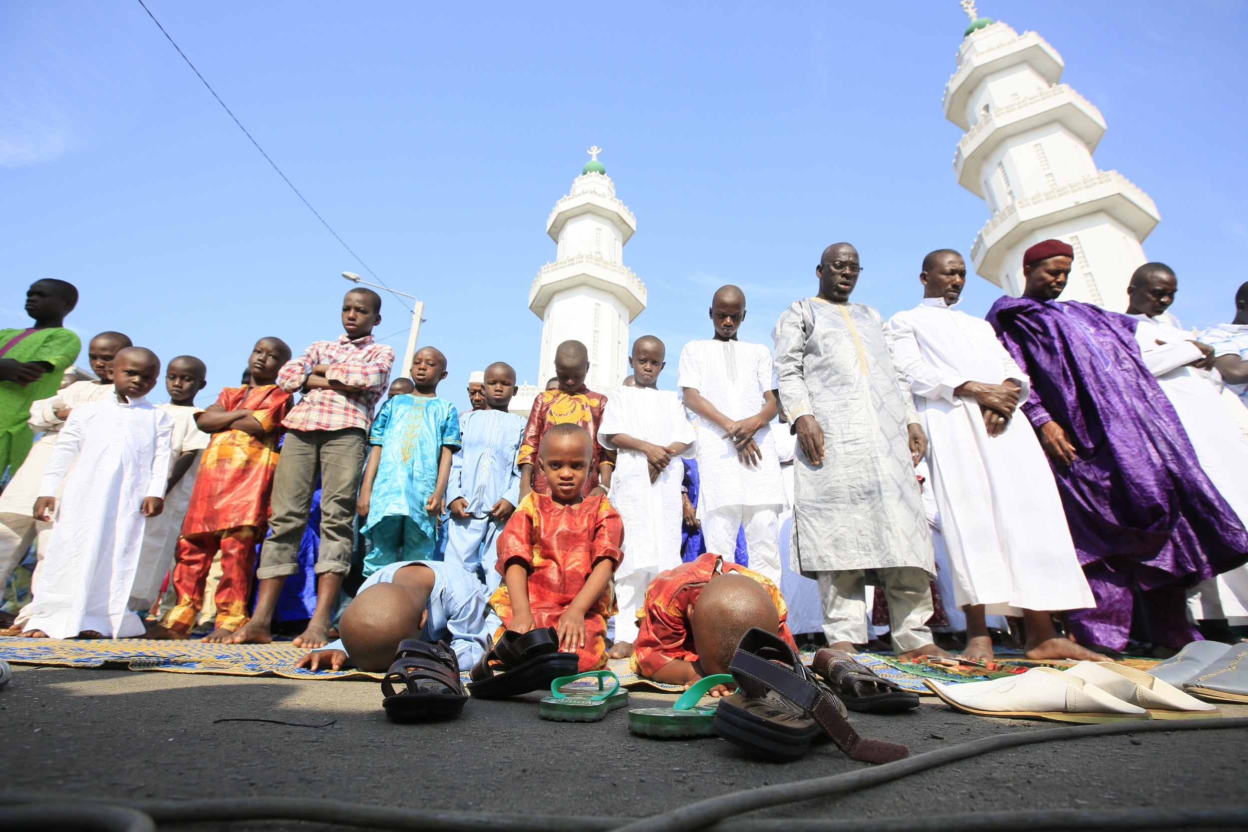 Ivorian Muslims pray during the first day of the Muslim festival of Eid-al- Adha in Abidjan
