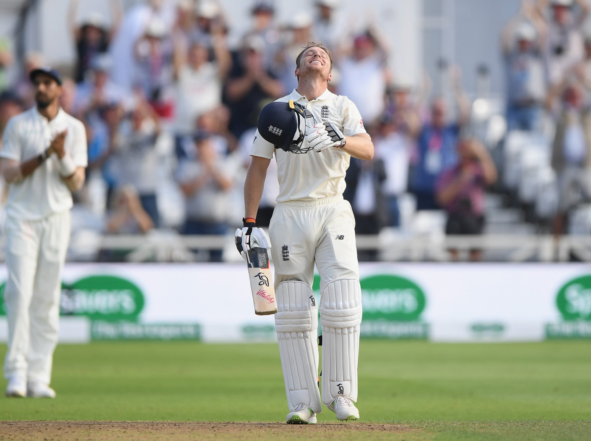 Jos Buttler celebrates after reaching his century