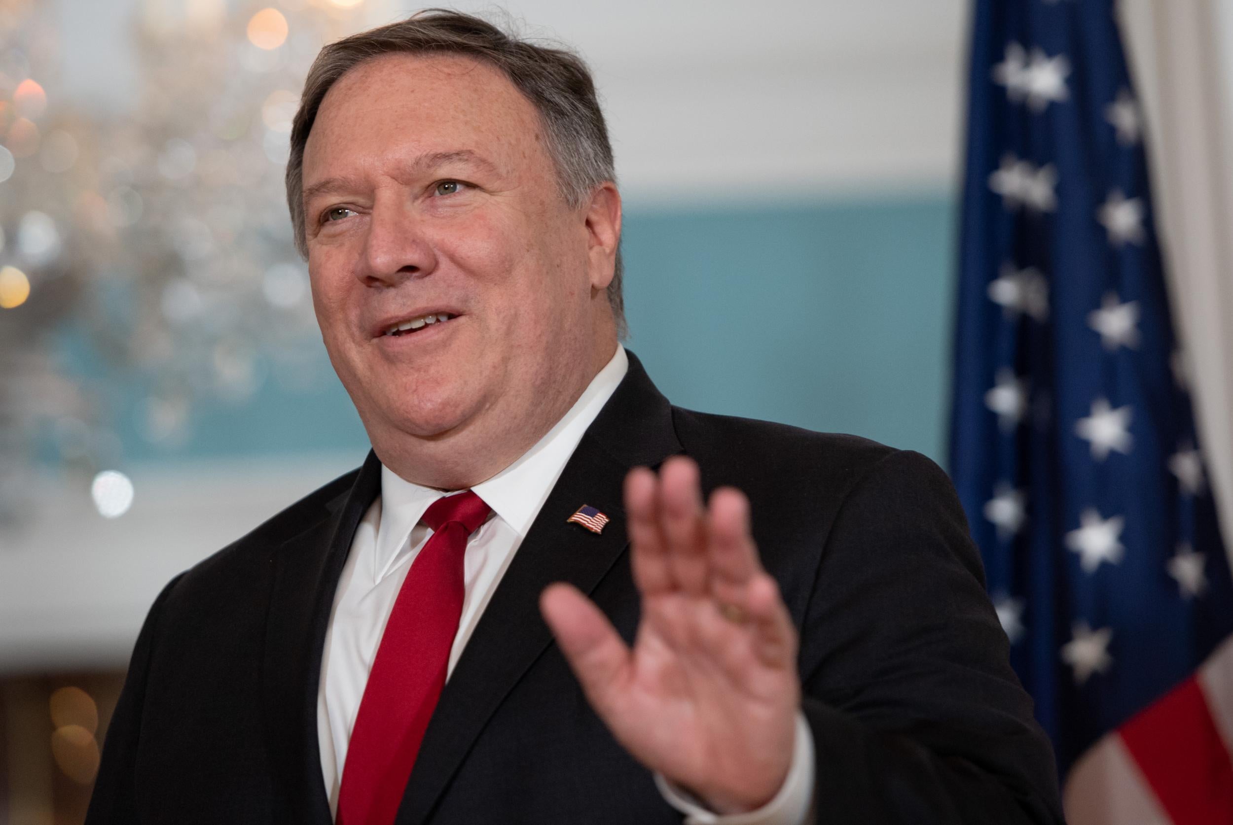 US secretary of state Mike Pompeo waves to the media during a photo opportunity at the State Department (Saul Loeb/AFP/Getty)