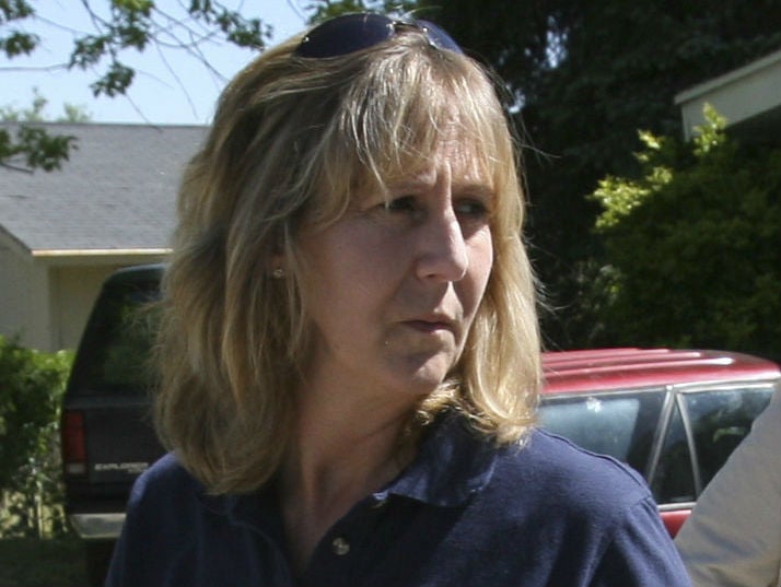 West Valley Code Enforcement Officer Jill Robinson checks a home for violations in West Valley City, Utah