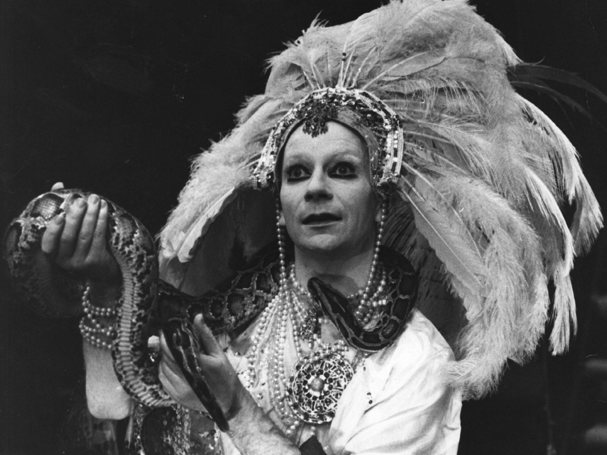 Lindsay Kemp holds a boa constrictor as he plays the title role in 'Salome' at The Round House, London