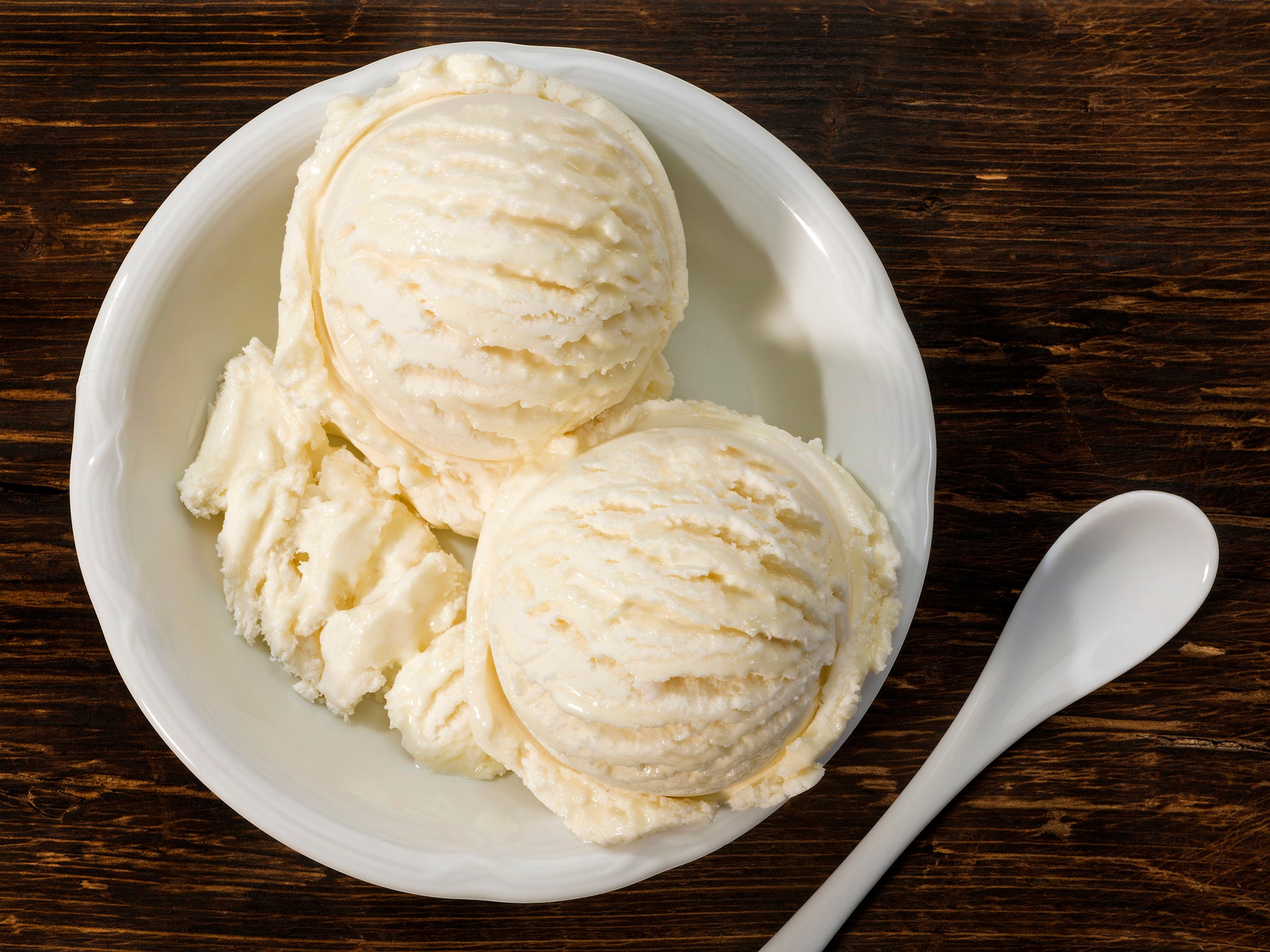 Vanilla ice cream is traditionally made from fresh milk, cream, egg yolks, sugar and vanilla, which are frozen and aerated to produce the final product