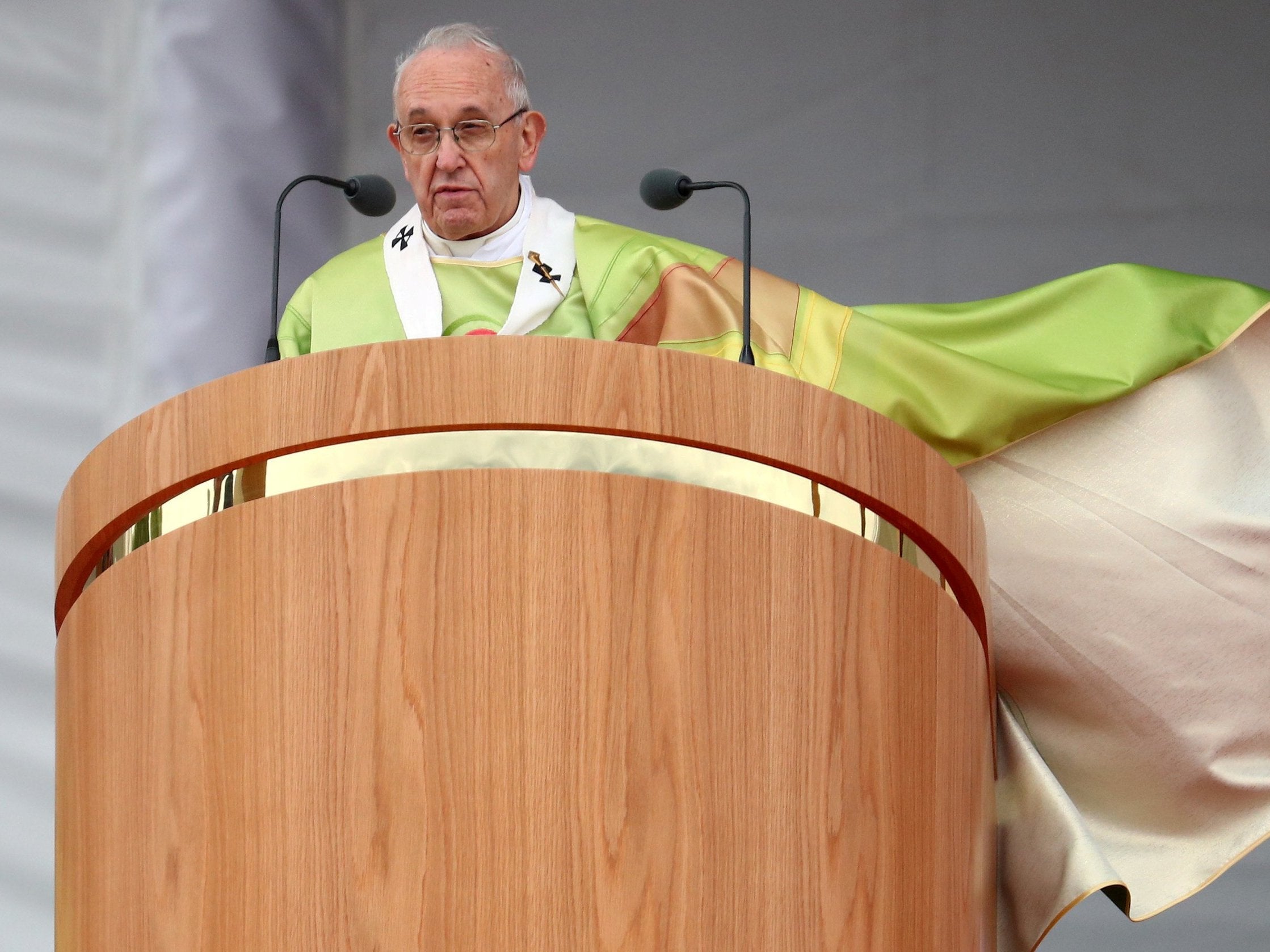 Hundreds of people, some of whom arrived as early as 6am, could be seen wearing waterproof ponchos and holding umbrellas at Knock in Co Mayo ahead of the Pope's arrival