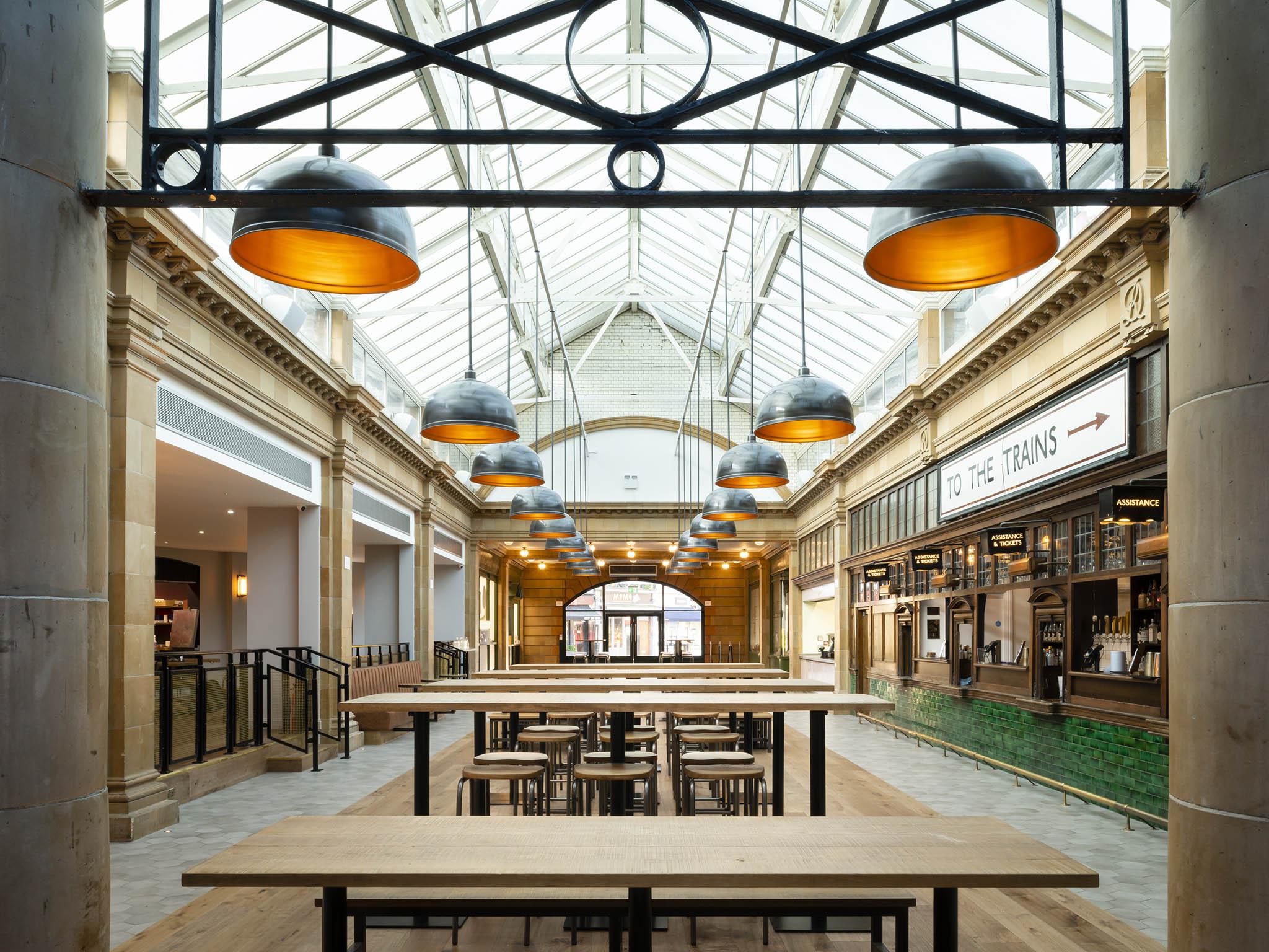 The revived Fulham Broadway station’s original ticket booth is now functioning as the bar (Market Halls)