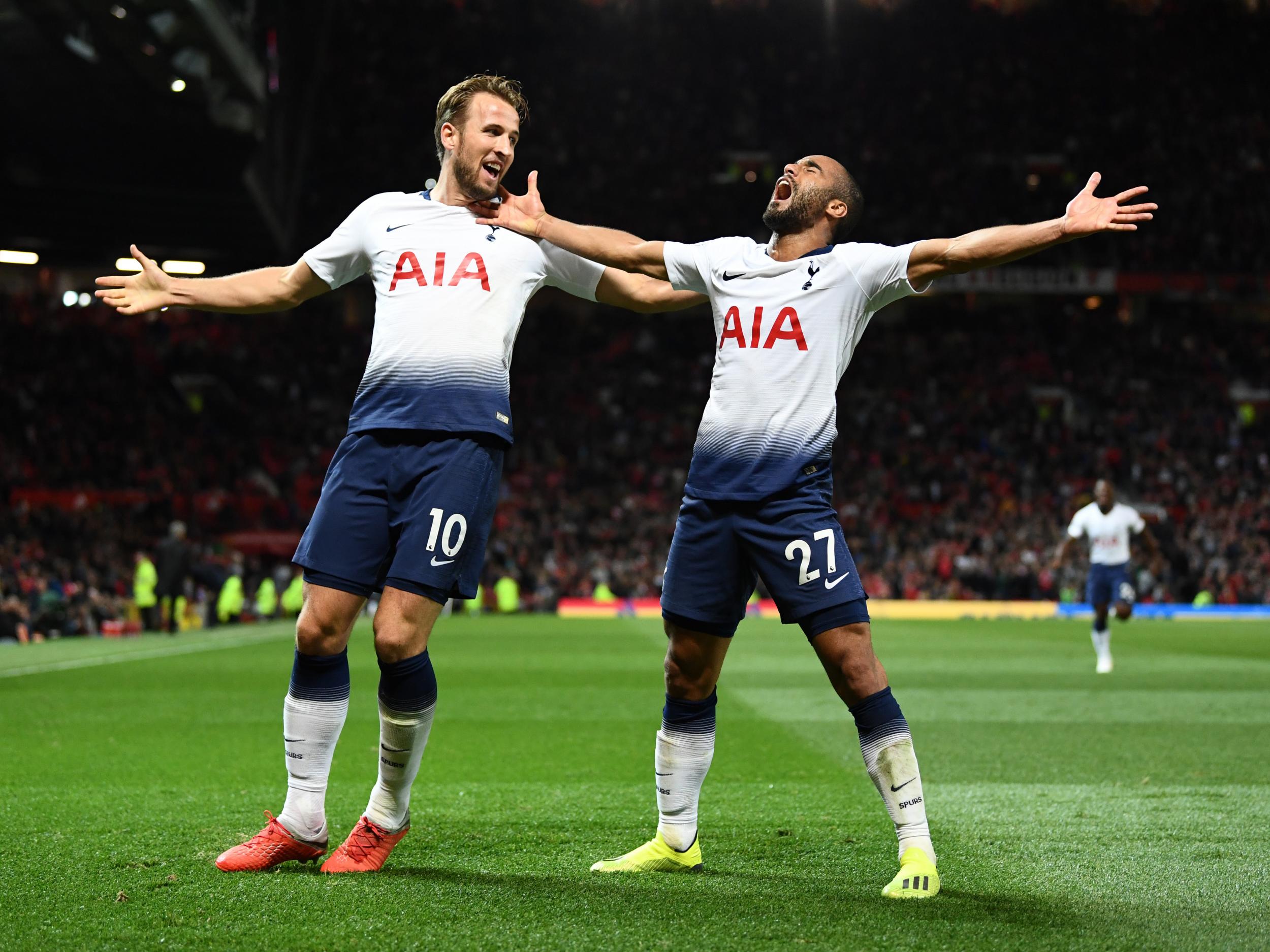 Harry Kane and Lucas Moura celebrate goals against Manchester United