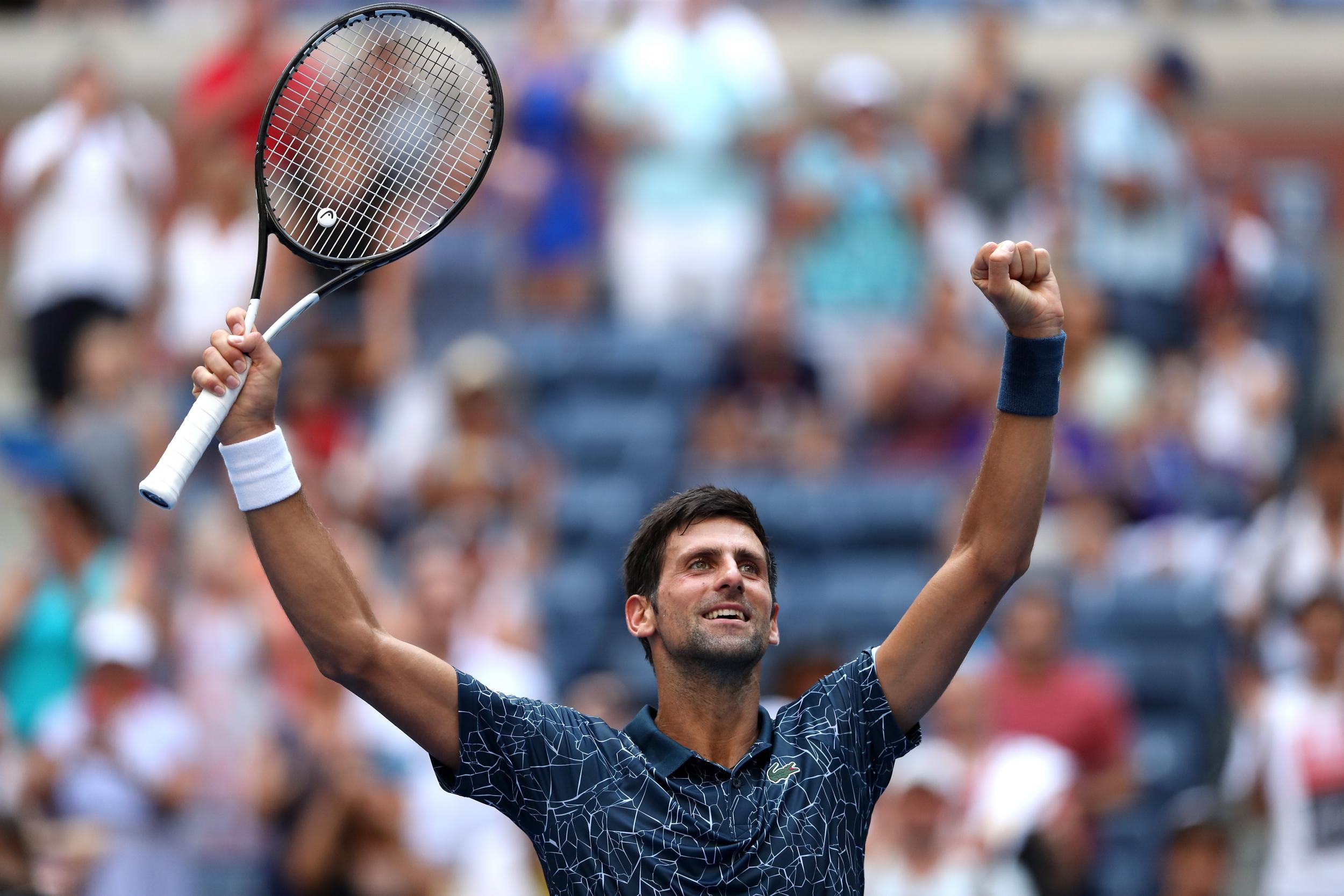 Novak Djokovic celebrates his win over Marton Fucsovics