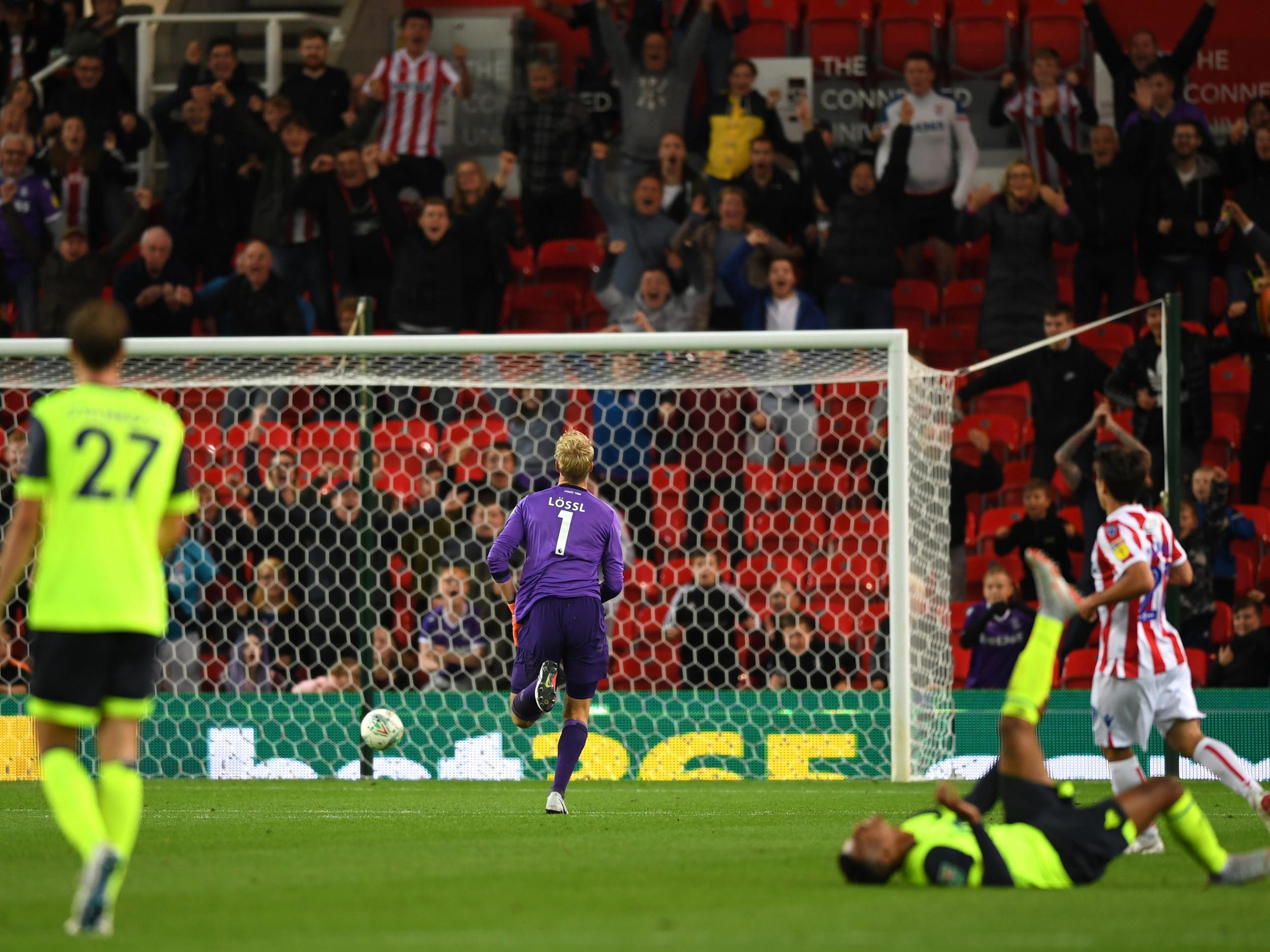 Bacuna falls to the ground after lobbing his own goalkeeper