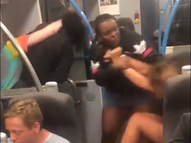 After removing her wig the woman launches her attack