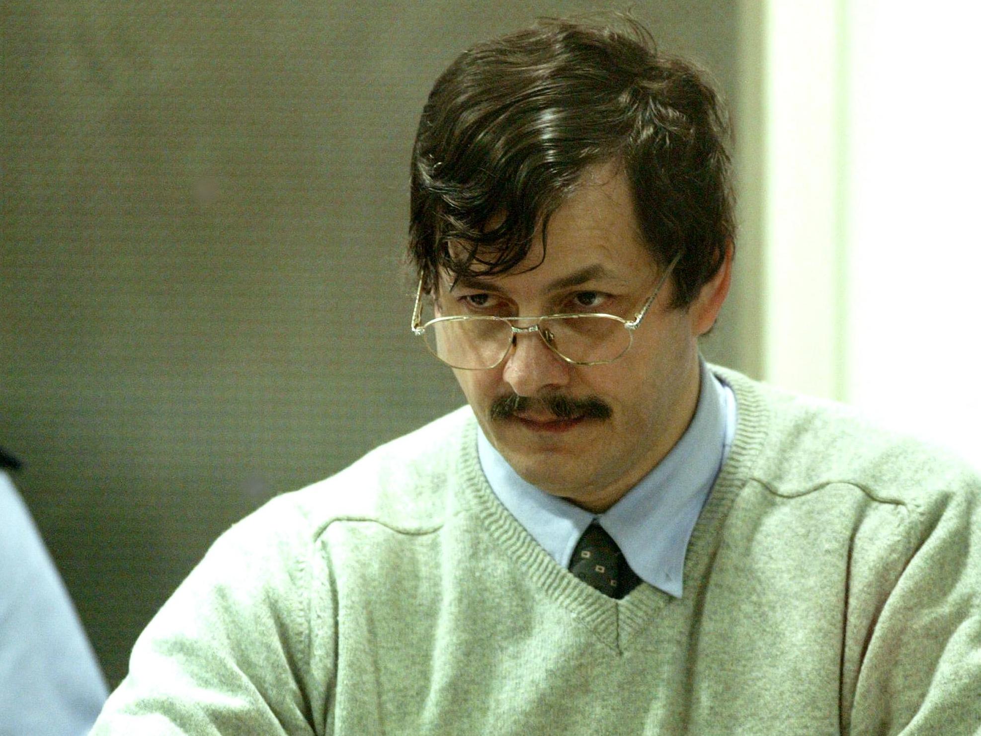 Belgian child rapist Marc Dutroux sits in the dock during his sentencing hearing in Arlon in 2004