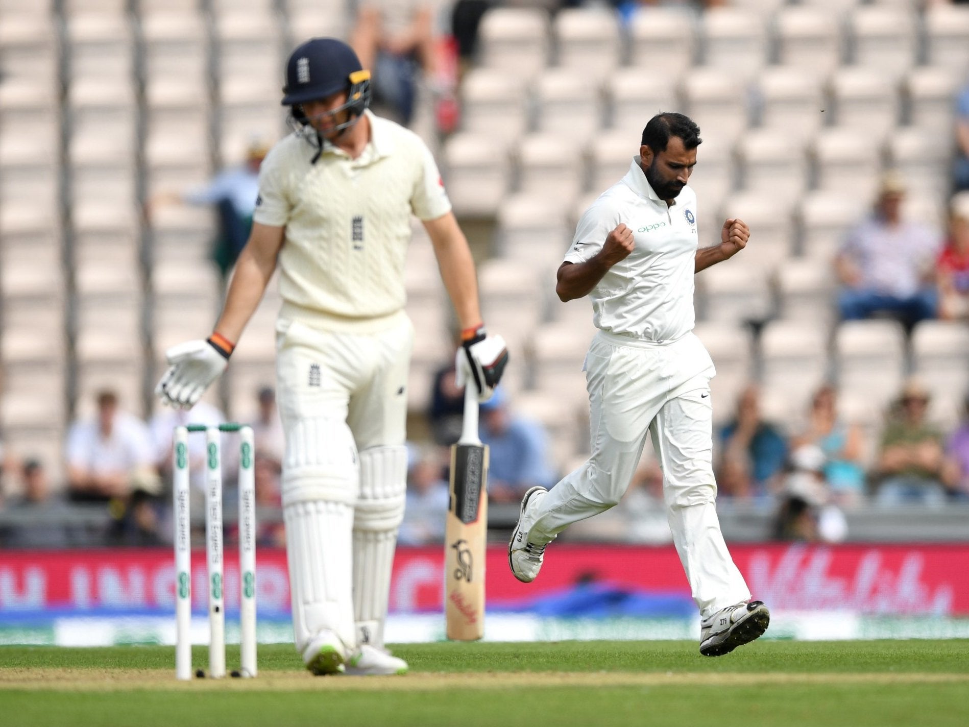 Mohammed Shami celebrates dismissing Jos Buttler