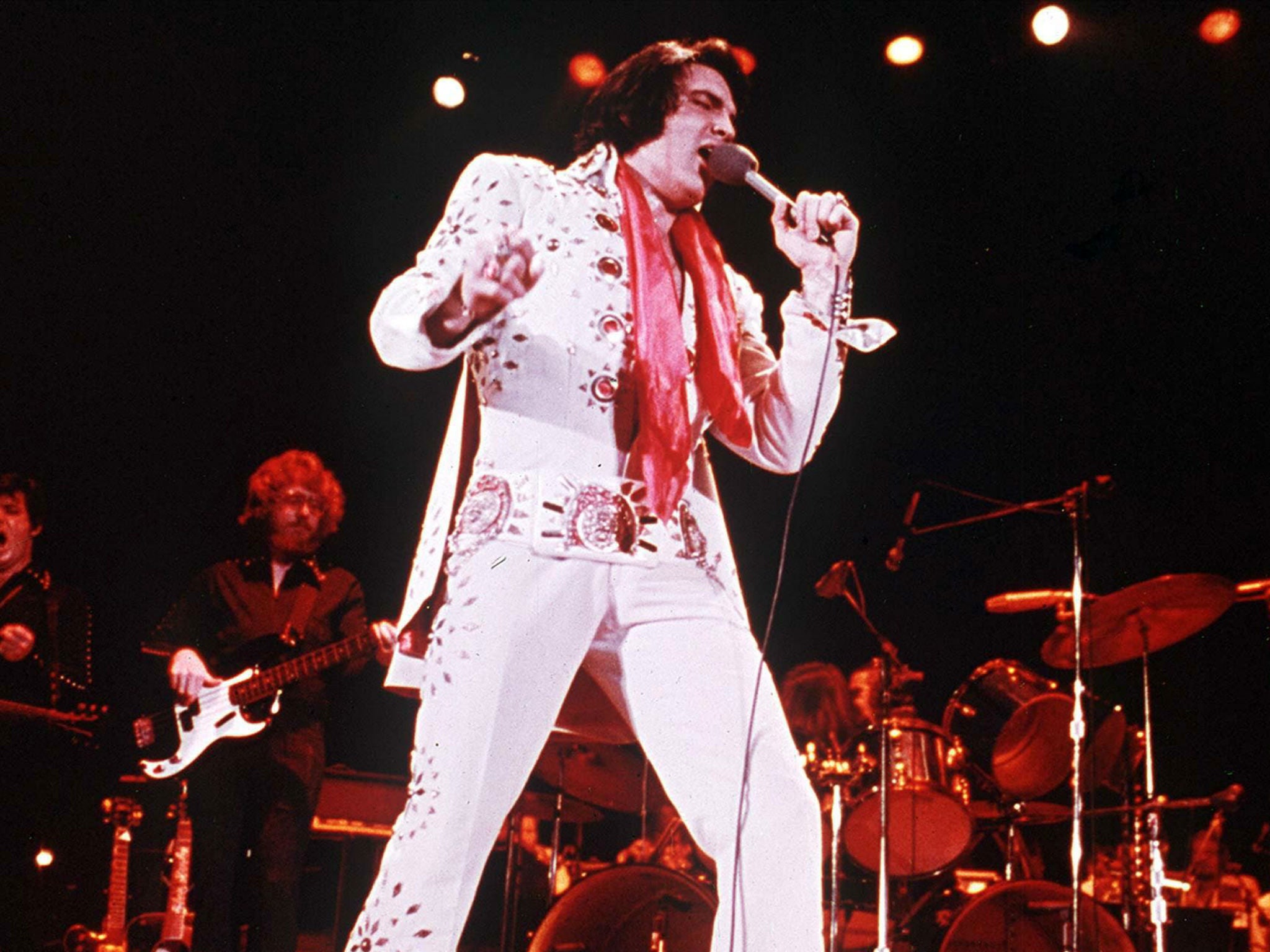 Elvis Presley performing in 1976, one year before his death (Rex/Shutterstock)