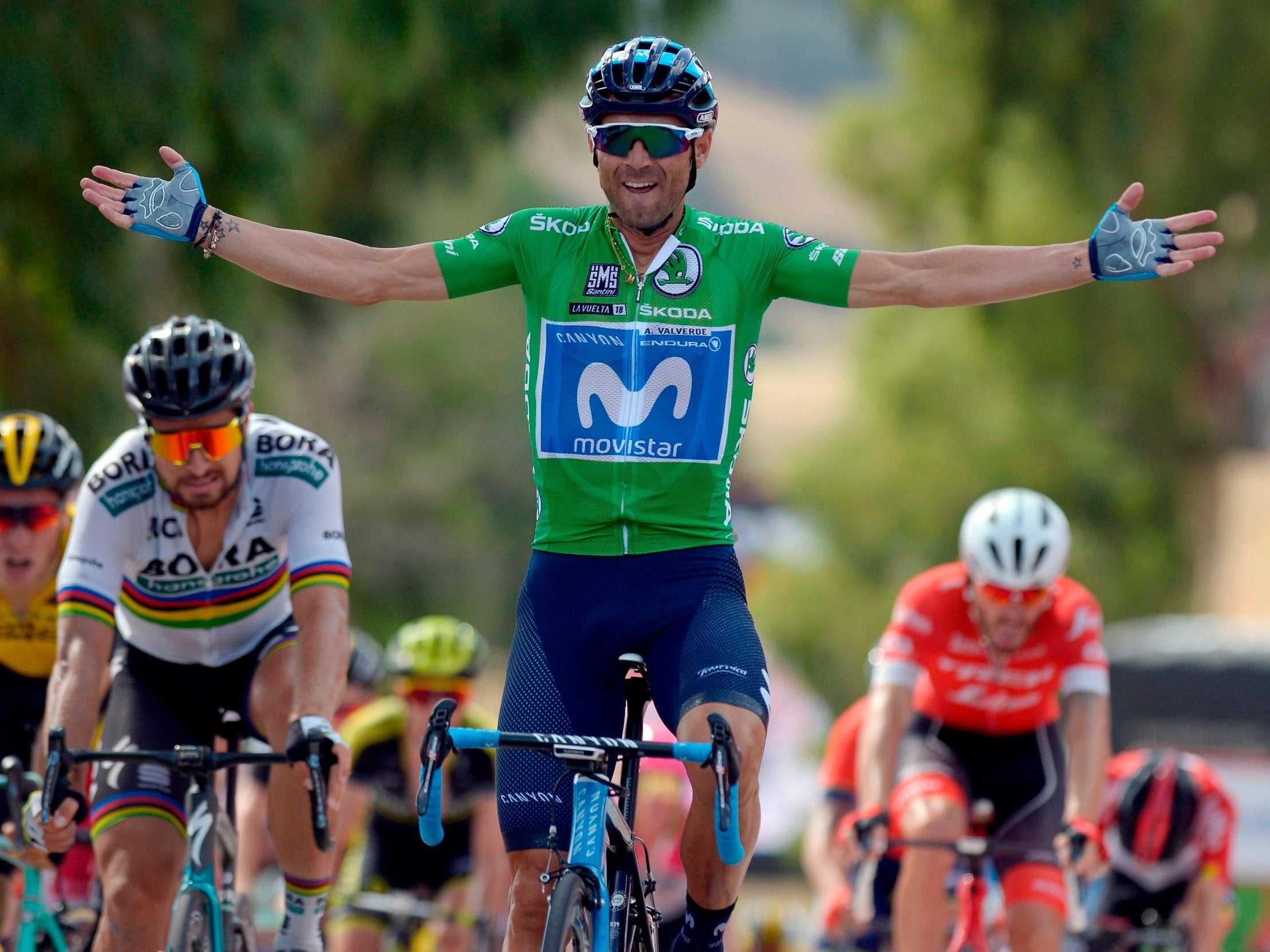 Movistar's Alejandro Valverde celebrates his victory on stage eight