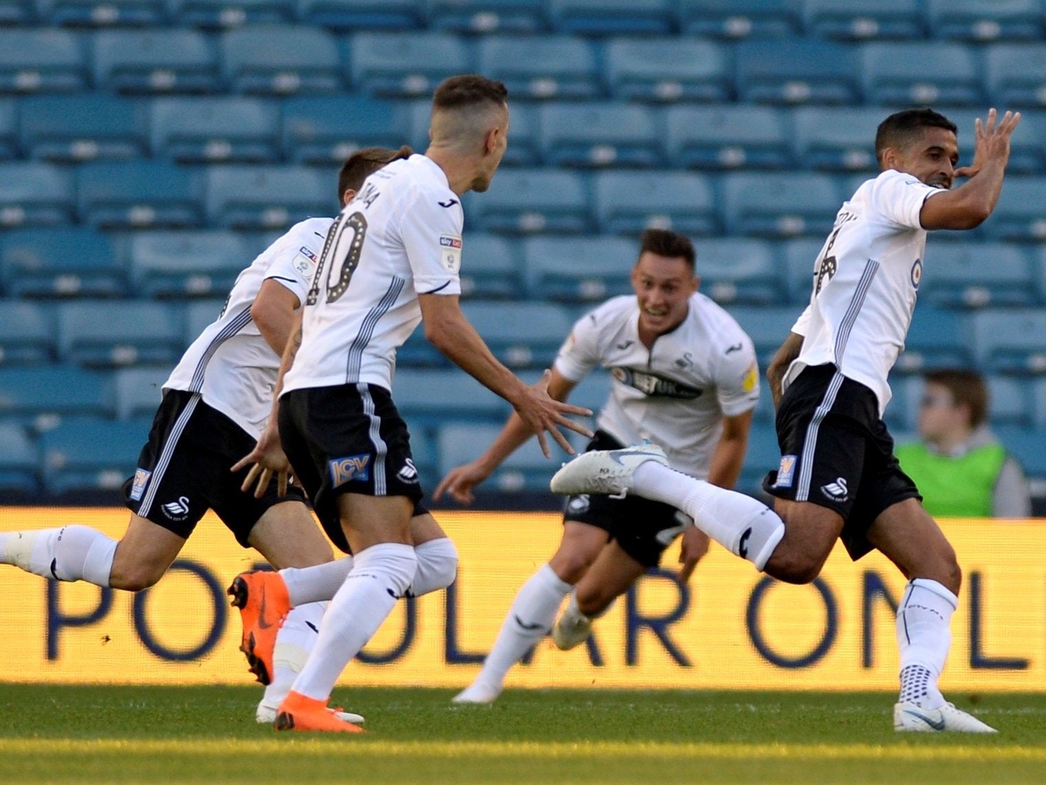 Kyle Naughton celebrates his second-half strike