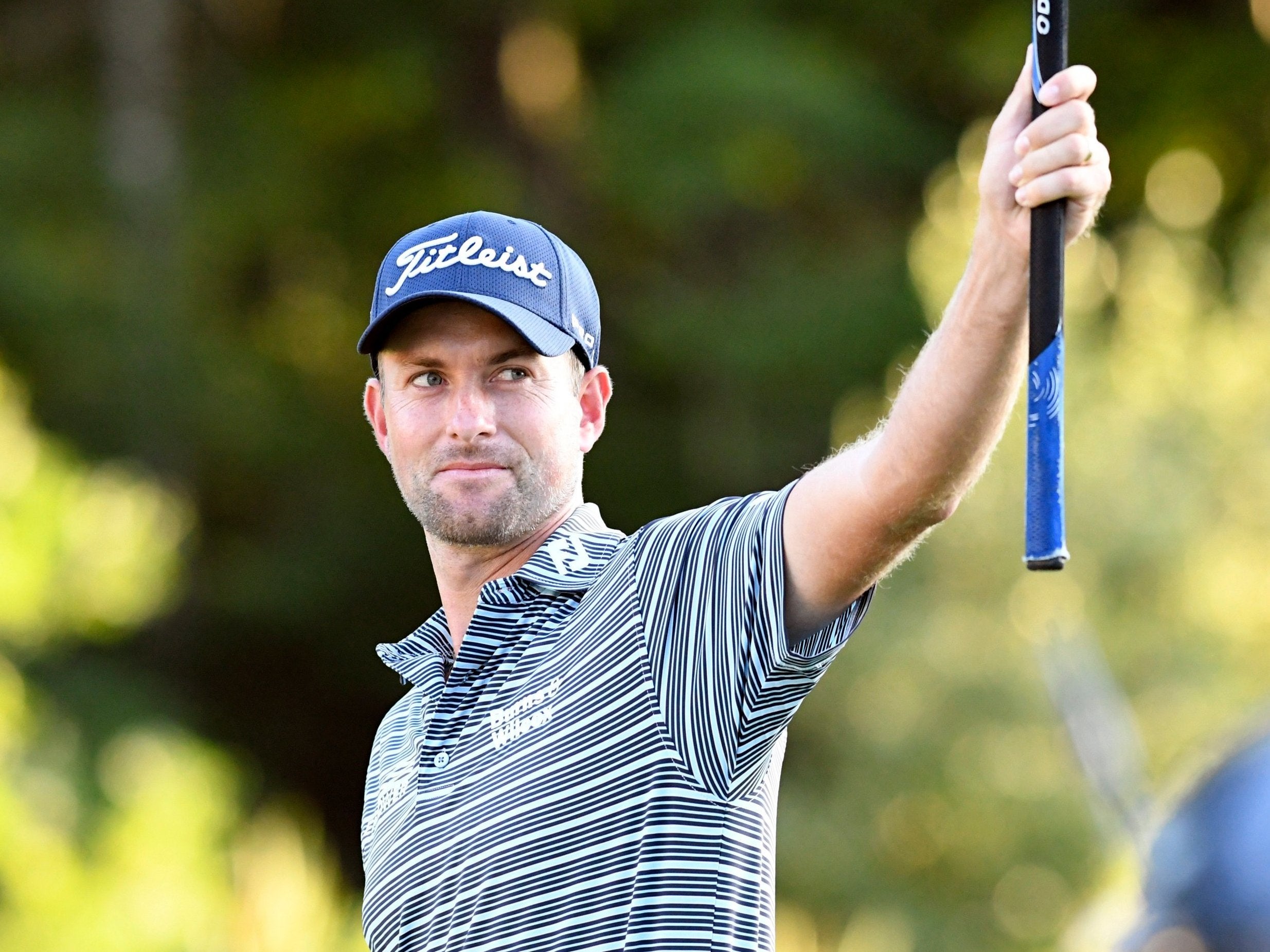 Webb Simpson holed an eagle on the 18th to take the lead