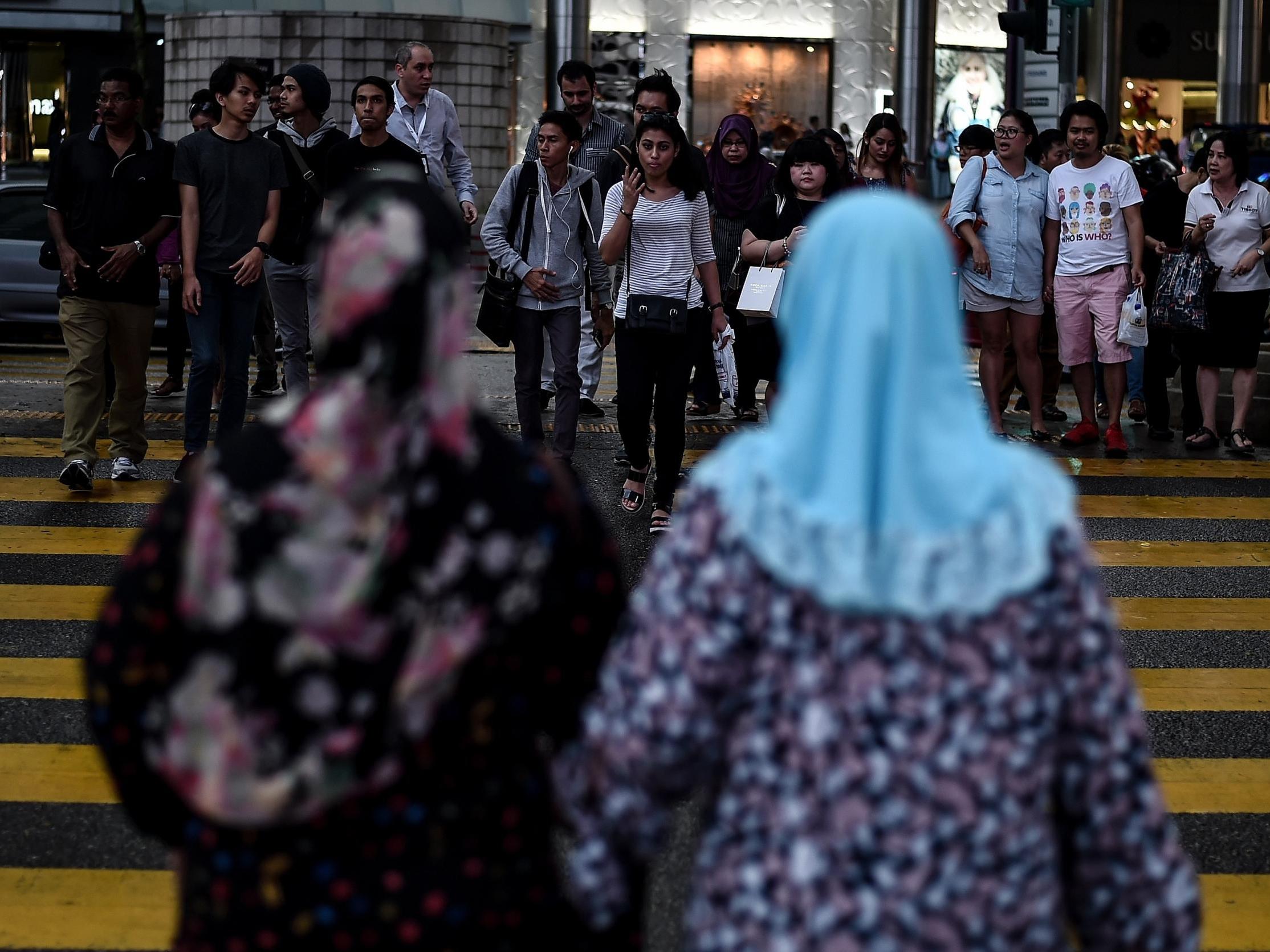 Two women were caned in front of 100 people in a Malaysian courtroom for attempting to take part in lesbian sex