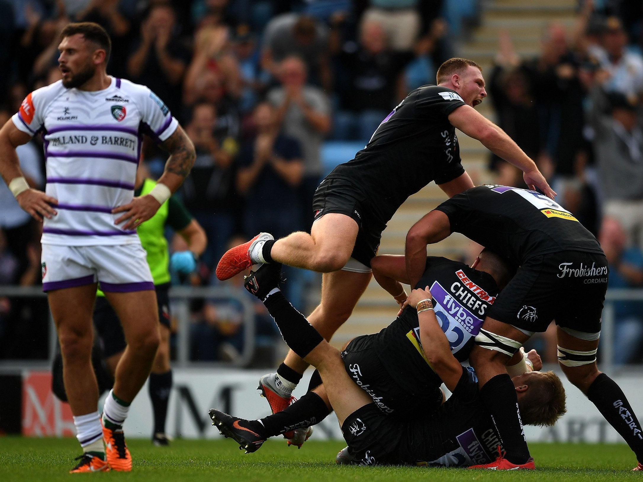 Exeter, celebrating, thrashed Leicester at Sandy Park