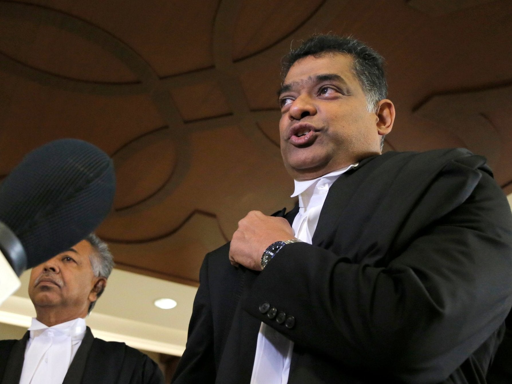 KA Ramu, lawyer for the American Gerald Wayne Mickelson, speaks to reporters after a court hearing at Kuala Lumpur High Court