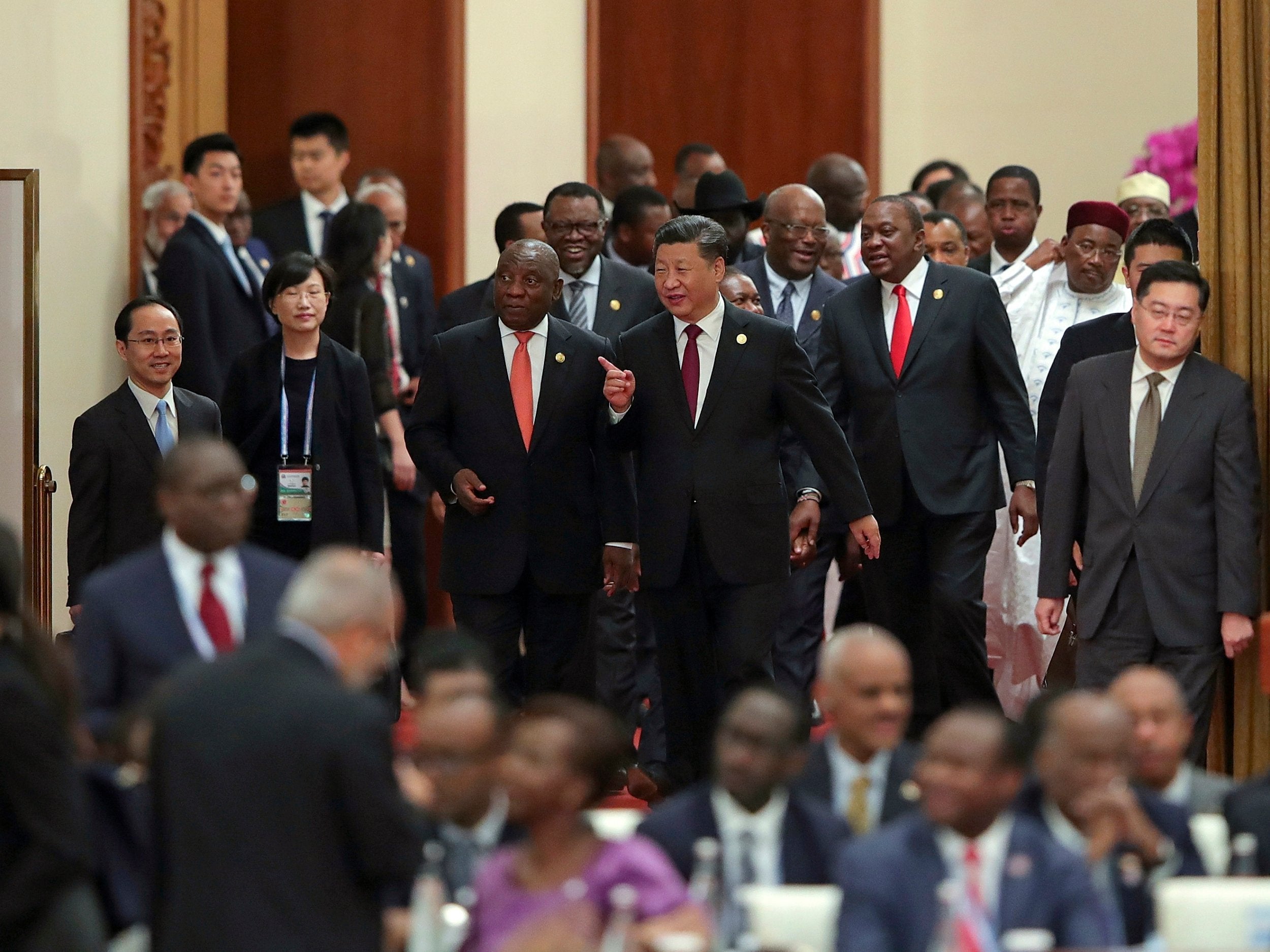 Chinese President Xi Jinping, centre, with South Africa's Cyril Ramaphosa, centre left, and other leaders behind, attend the 2018 Beijing FOCAC summit