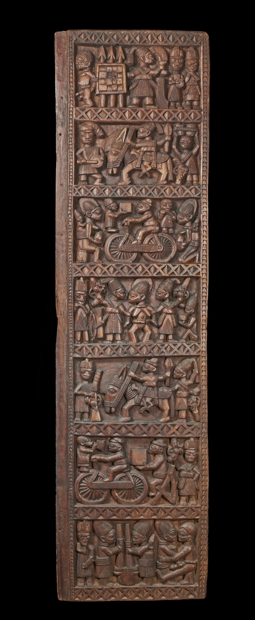 Colonialism: this hand-carved Nigerian door mocks the British Empire