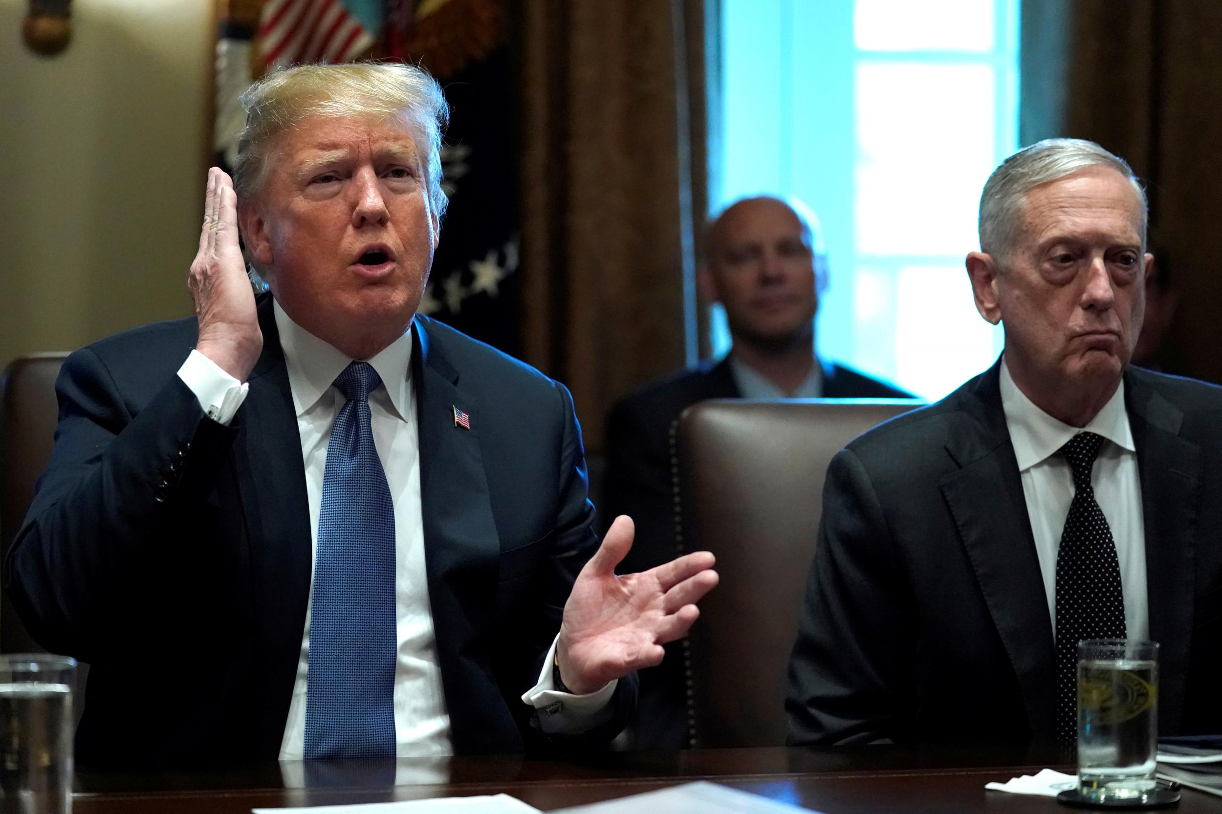 President Donald Trump speaks as Defense Secretary&nbsp;James Mattis listens during a cabinet meeting at the White House in Washington, US 21 June 2018