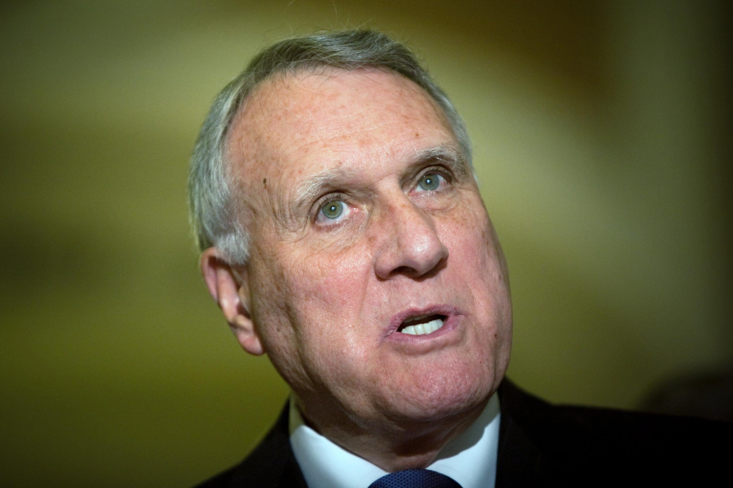 Former US Senator Jon Kyl speaks as Senate Republican leadership hold a press conference in 2012