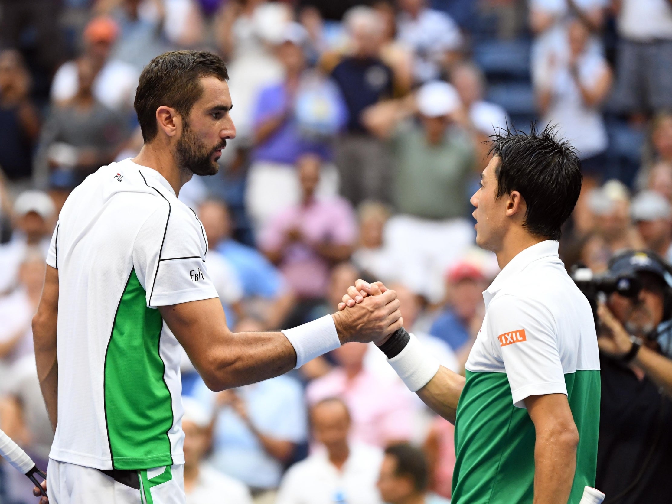 The pair shake hands after an epic five-set quarter-final