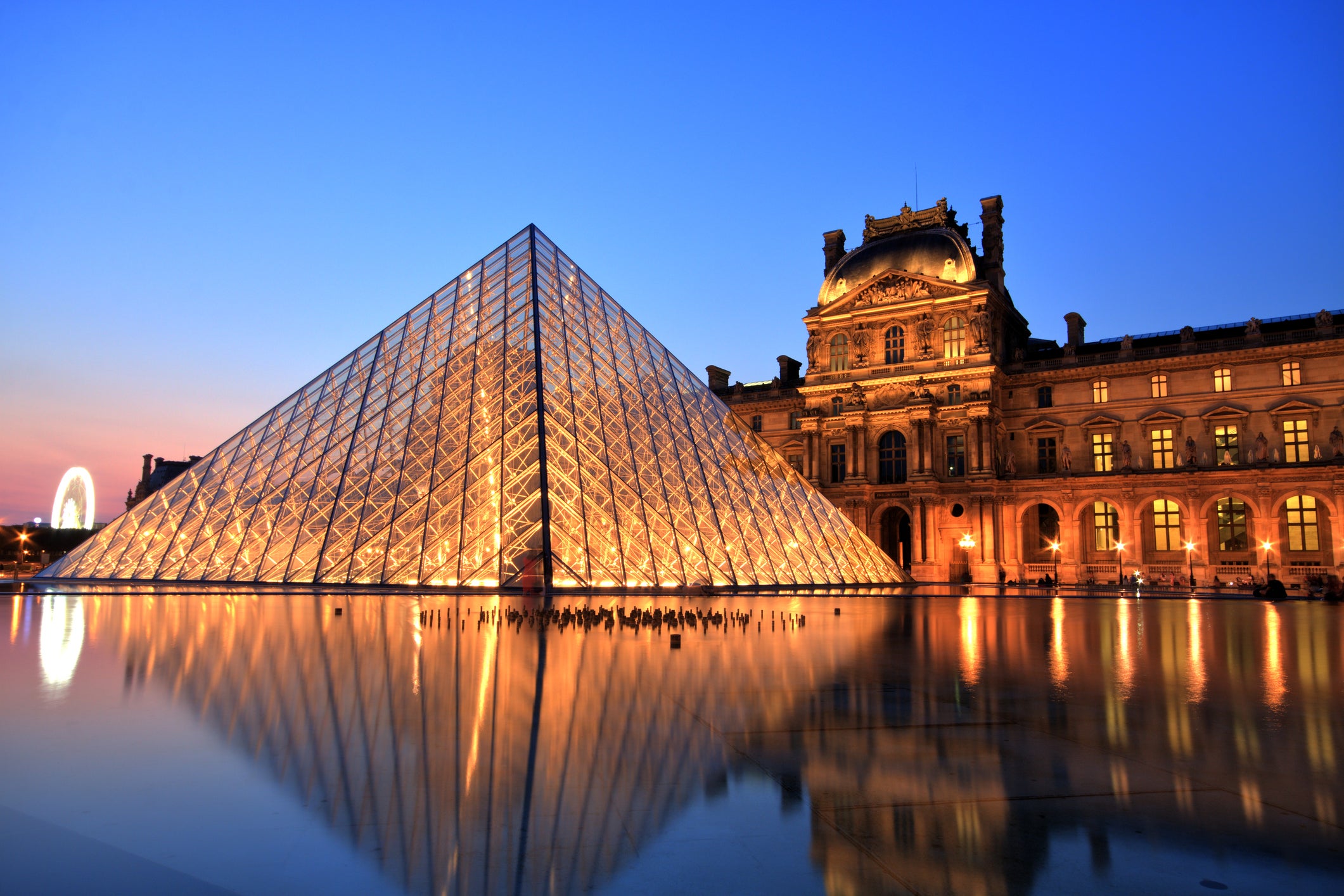 Chinese-American architect IM Pei designed the modern pyramid entrance to the Louvre Museum