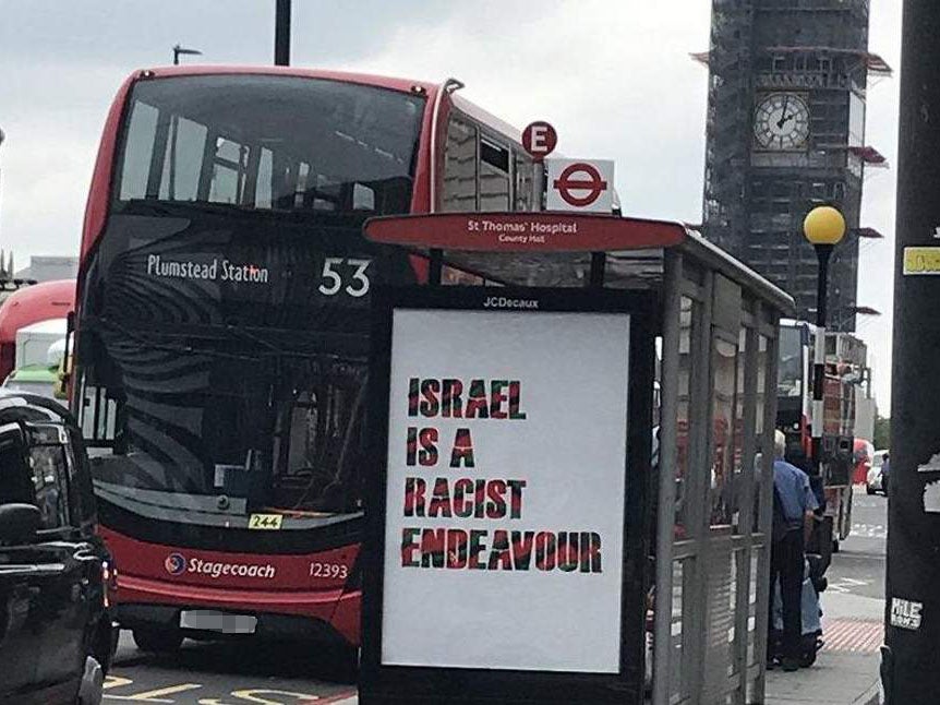 Anti-Israel sign at a bus stop in Westminster