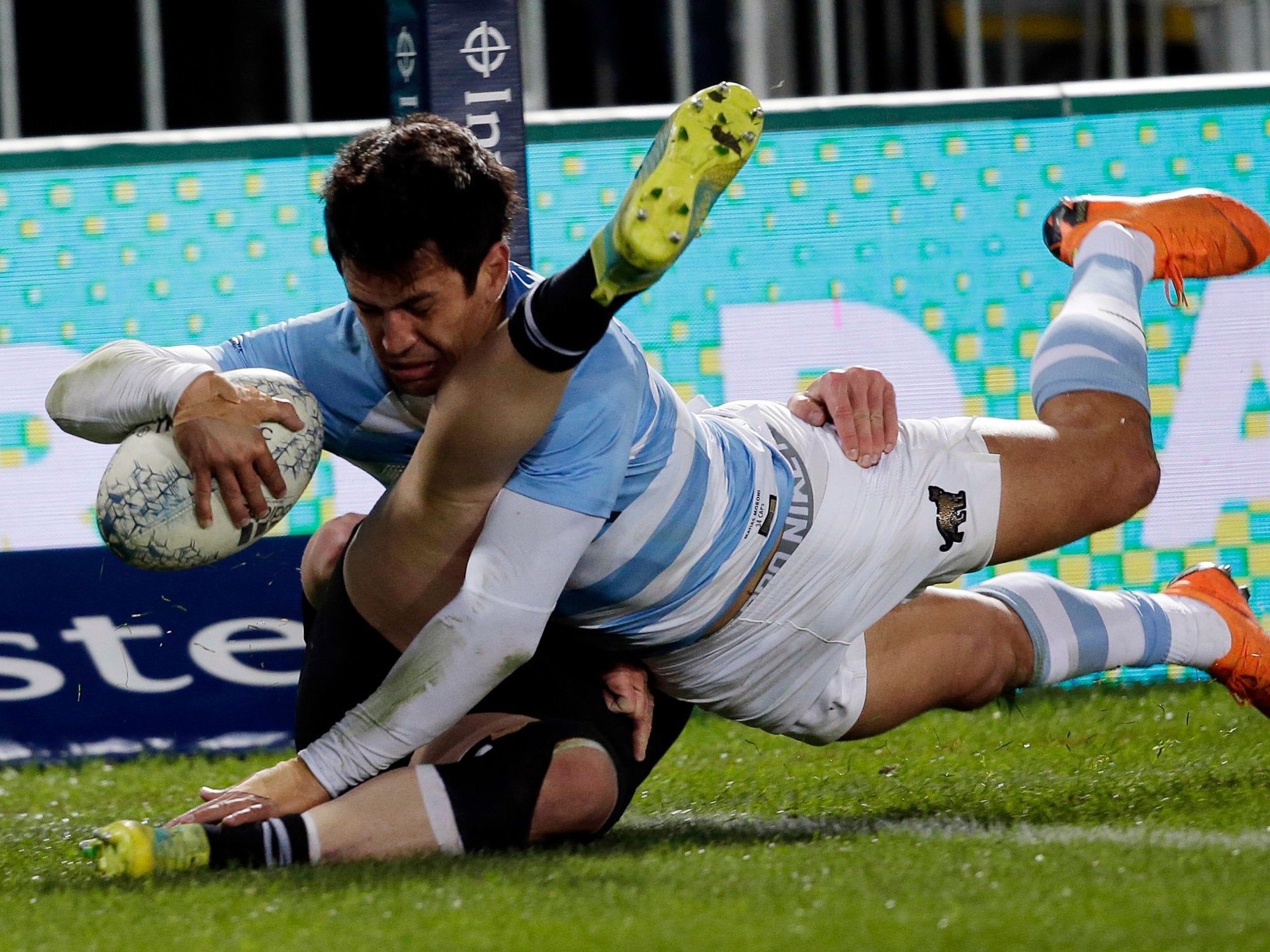 TJ Perenara prevents Marcelo Bosch from scoring a try