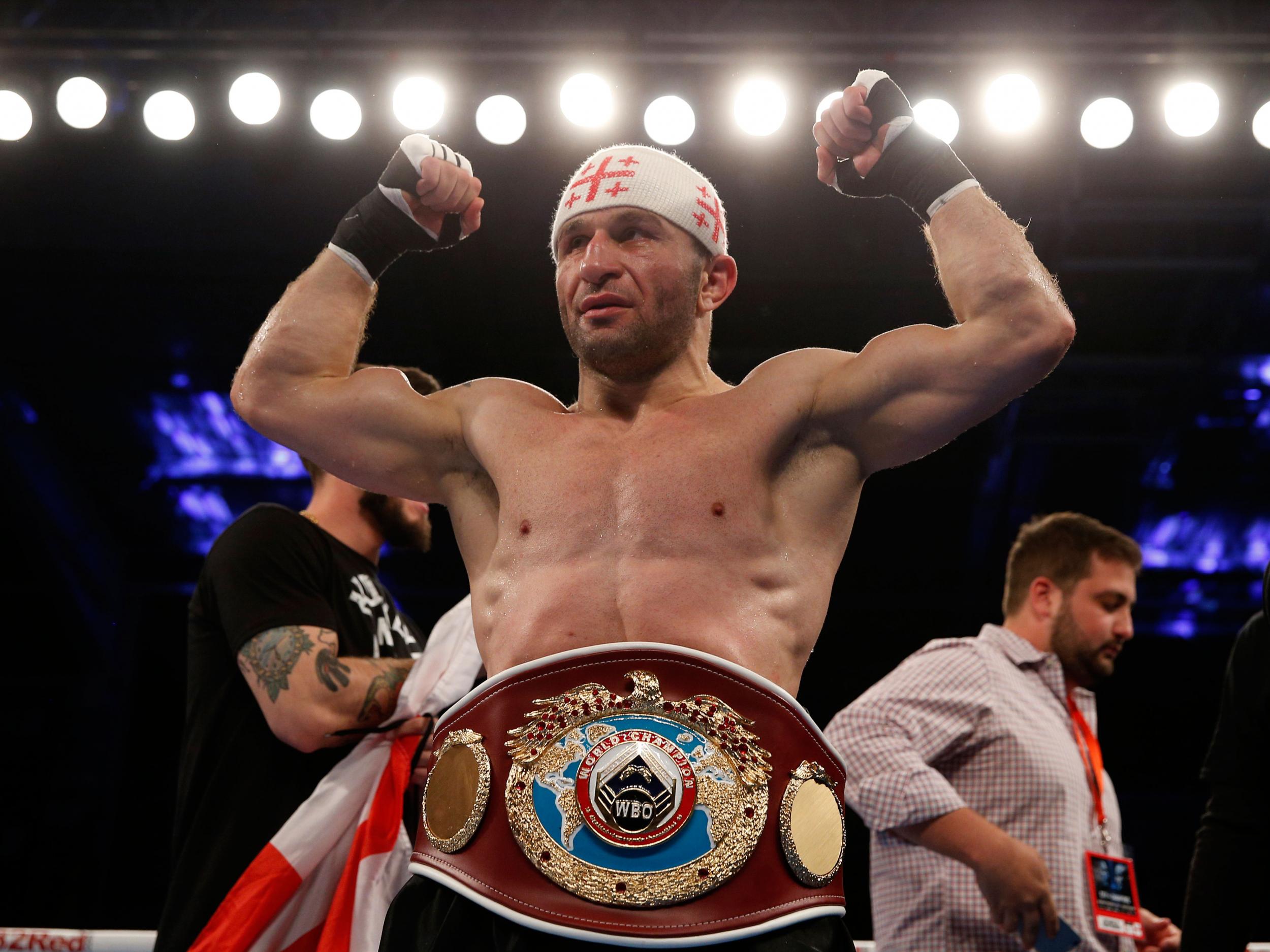 Avtandil Khurtsidze celebrating his interim WBA middleweight title win. He has now been jailed for 10 years for his role as 'chief enforcer' for an organised crime syndicate