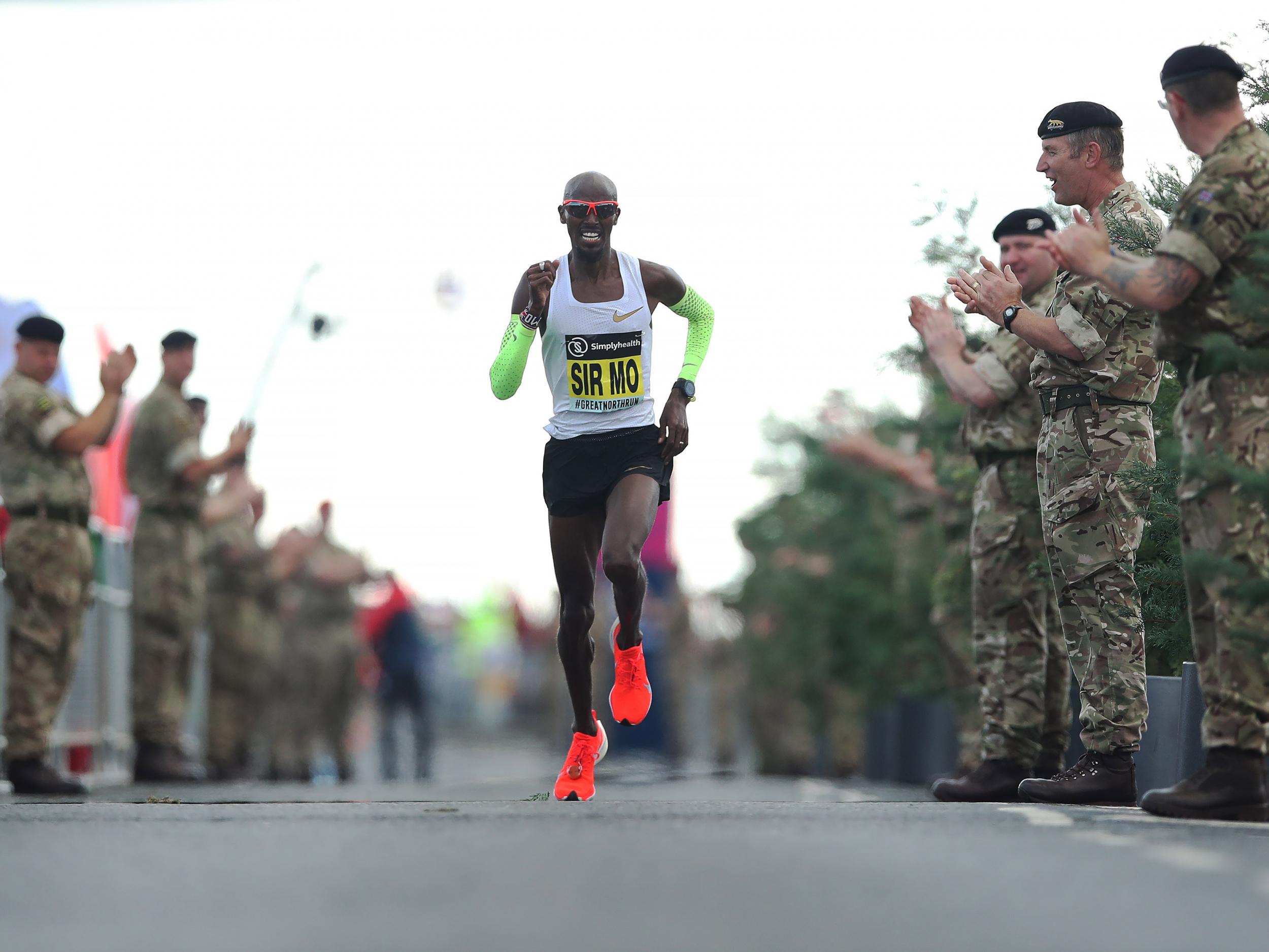 Farah takes the the applause with 'SIR MO' written across his top