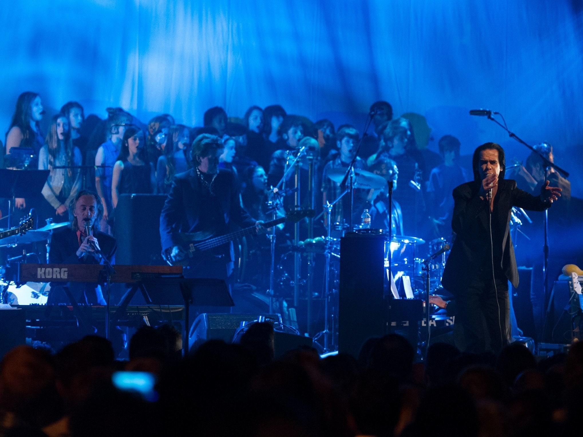 Savage onstage with the band in Los Angeles, 2013