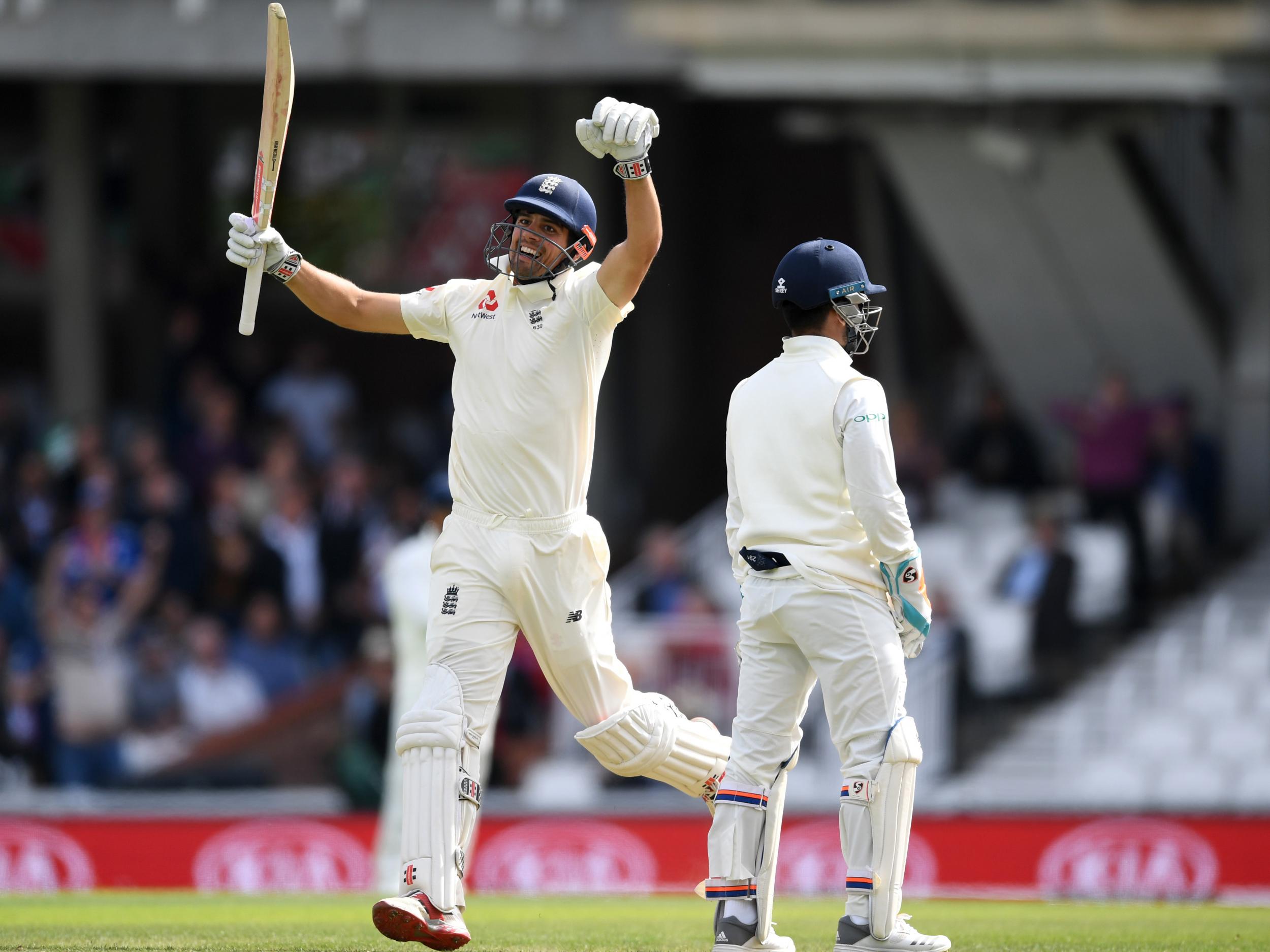 Alastair Cook jumps for joy after securing a century in his final England match