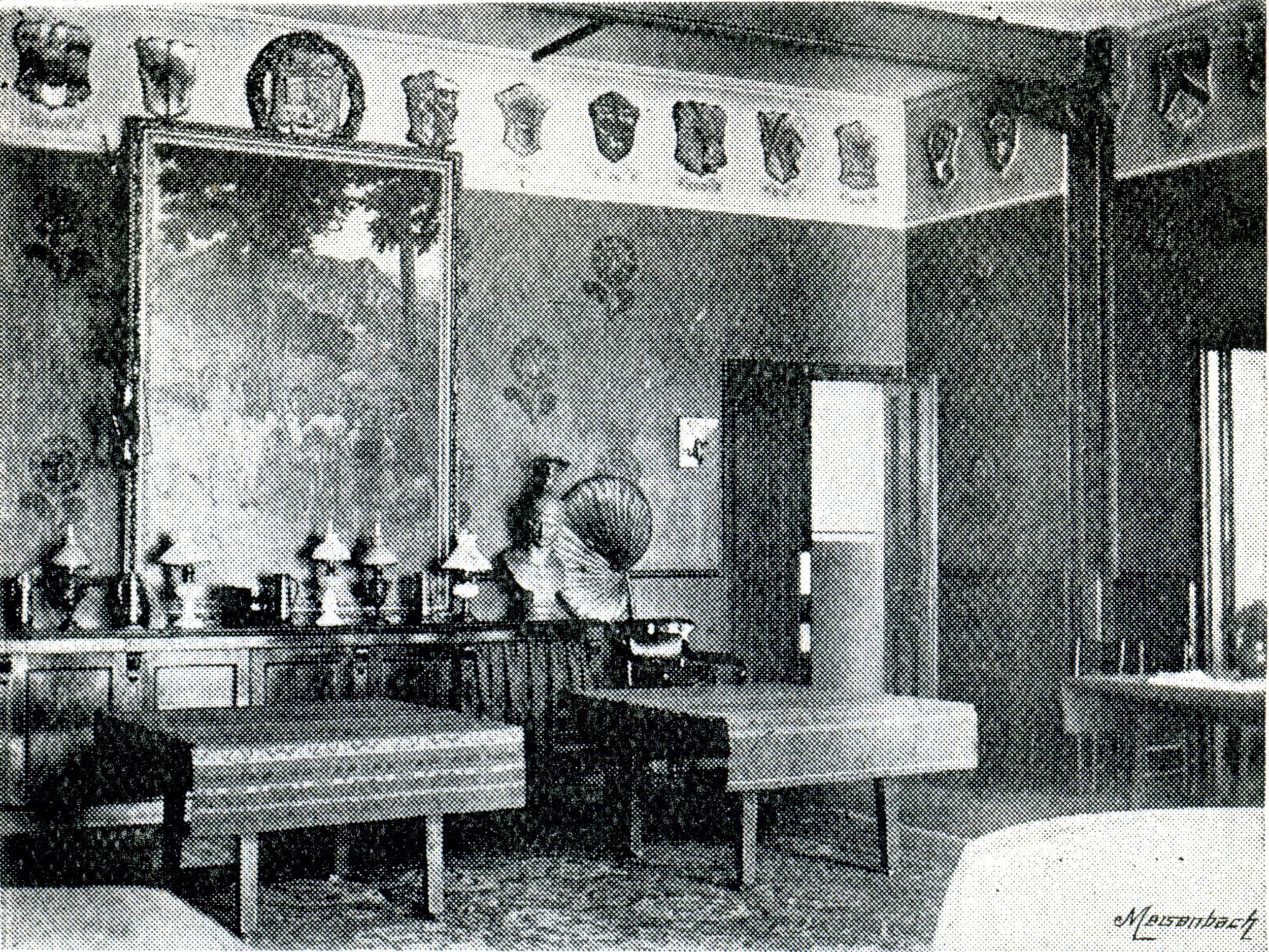 The Toynbee Hall dining room in 1895: the first volunteer residents were all Oxbridge graduates and ate beneath the crests of their old colleges (Toynbee Hall Archives)