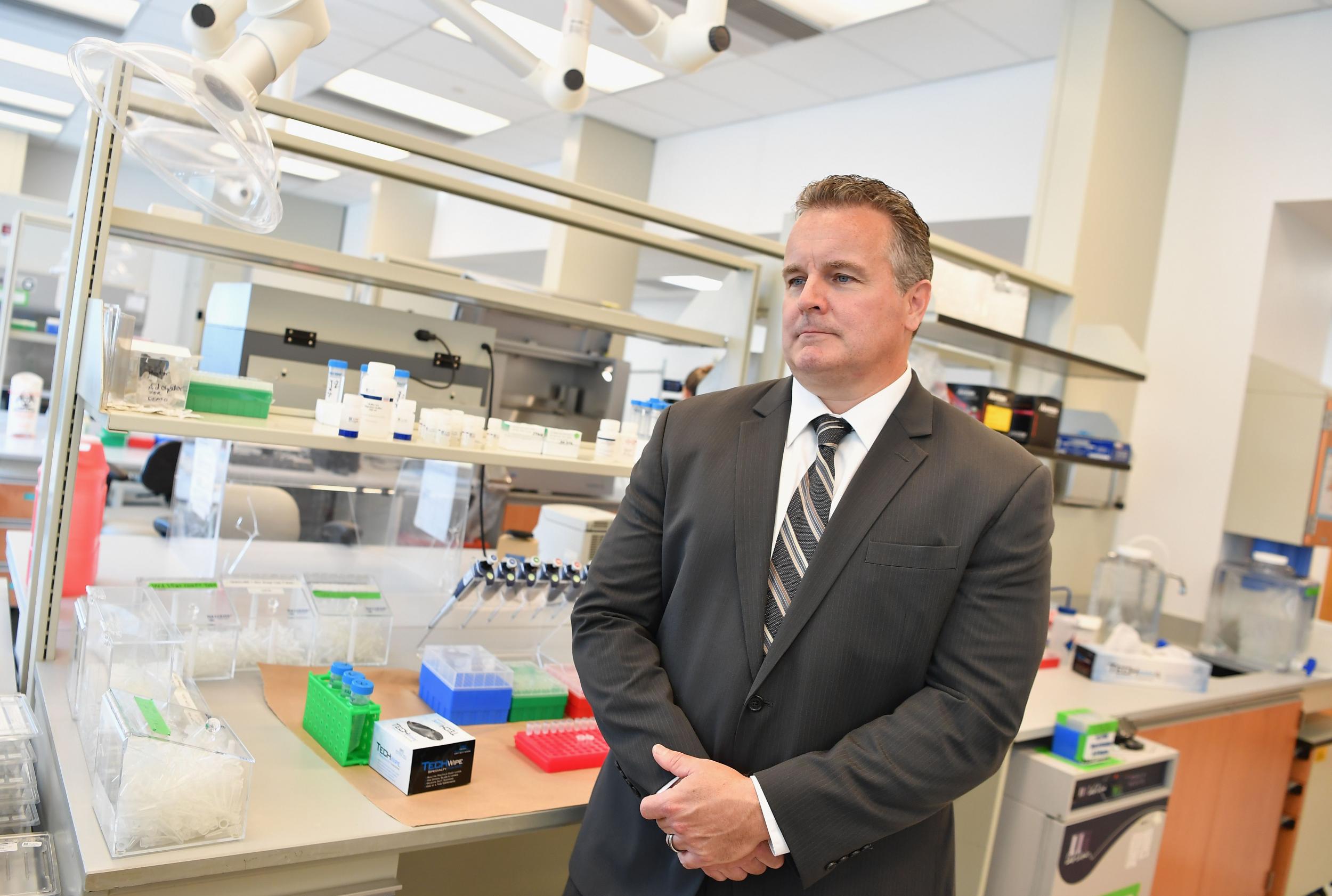 Assistant Director of Forensic Biology Mark Desire speaks to media as the New York City Office of Chief Medical Examiner hosts DNA Extraction demonstration