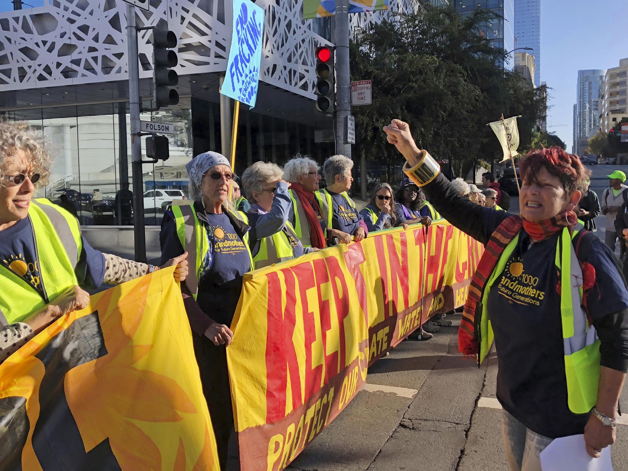 Protesters gathering outside the Global Climate Action Summit in San Francisco