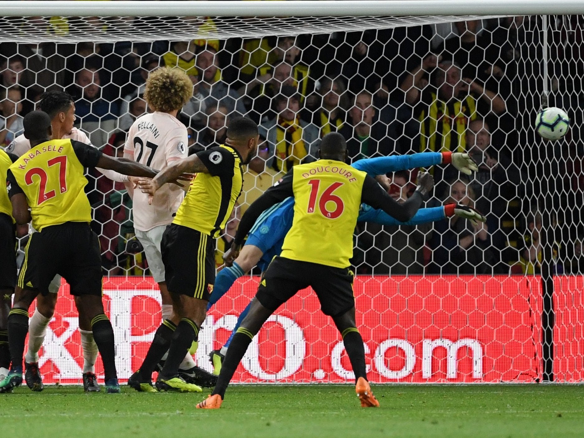 David de Gea makes a diving save at Vicarage Road