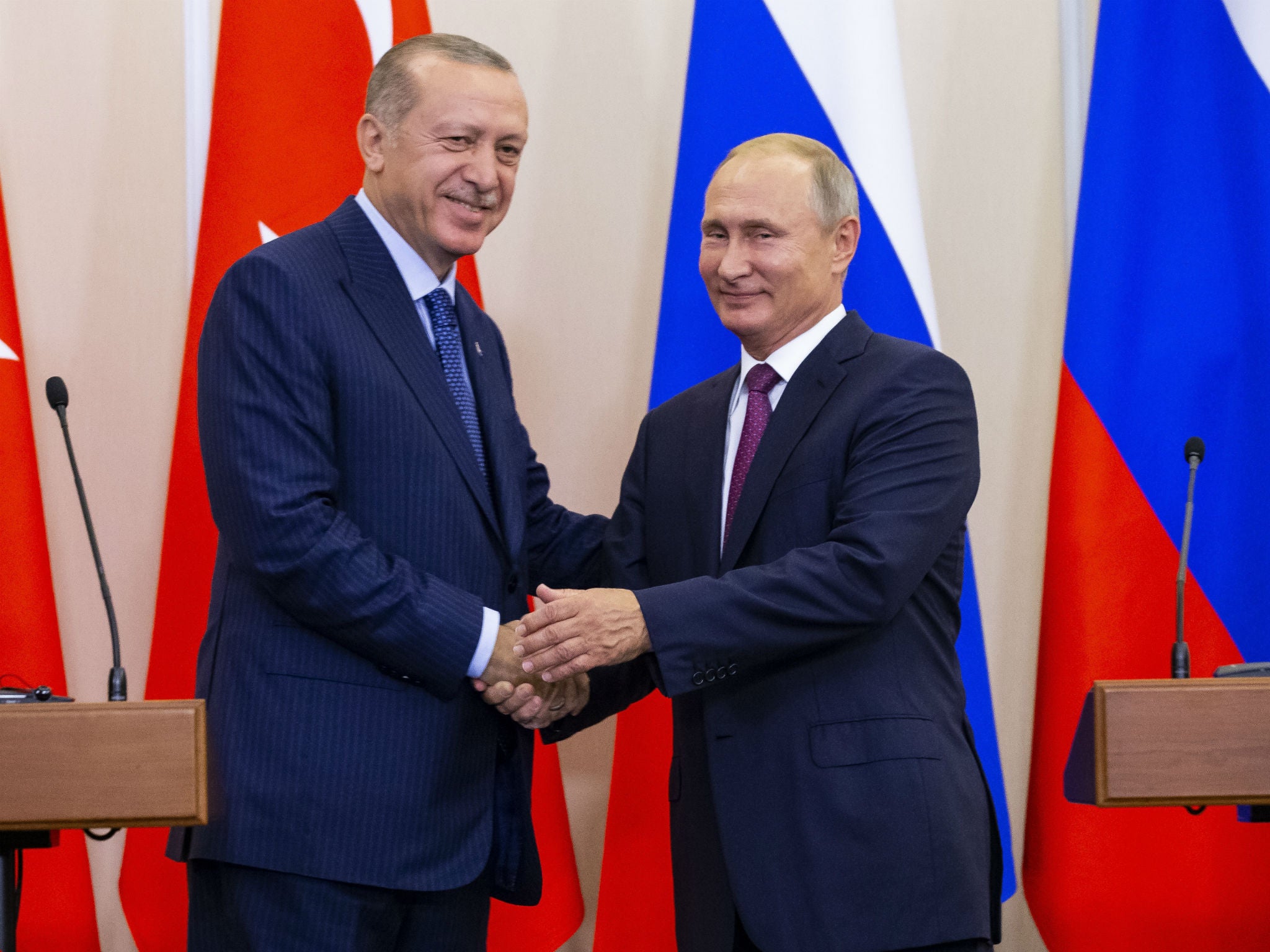 Russian President Vladimir Putin, right, and Turkish President Recep Tayyip Erdogan after talks in Sochi